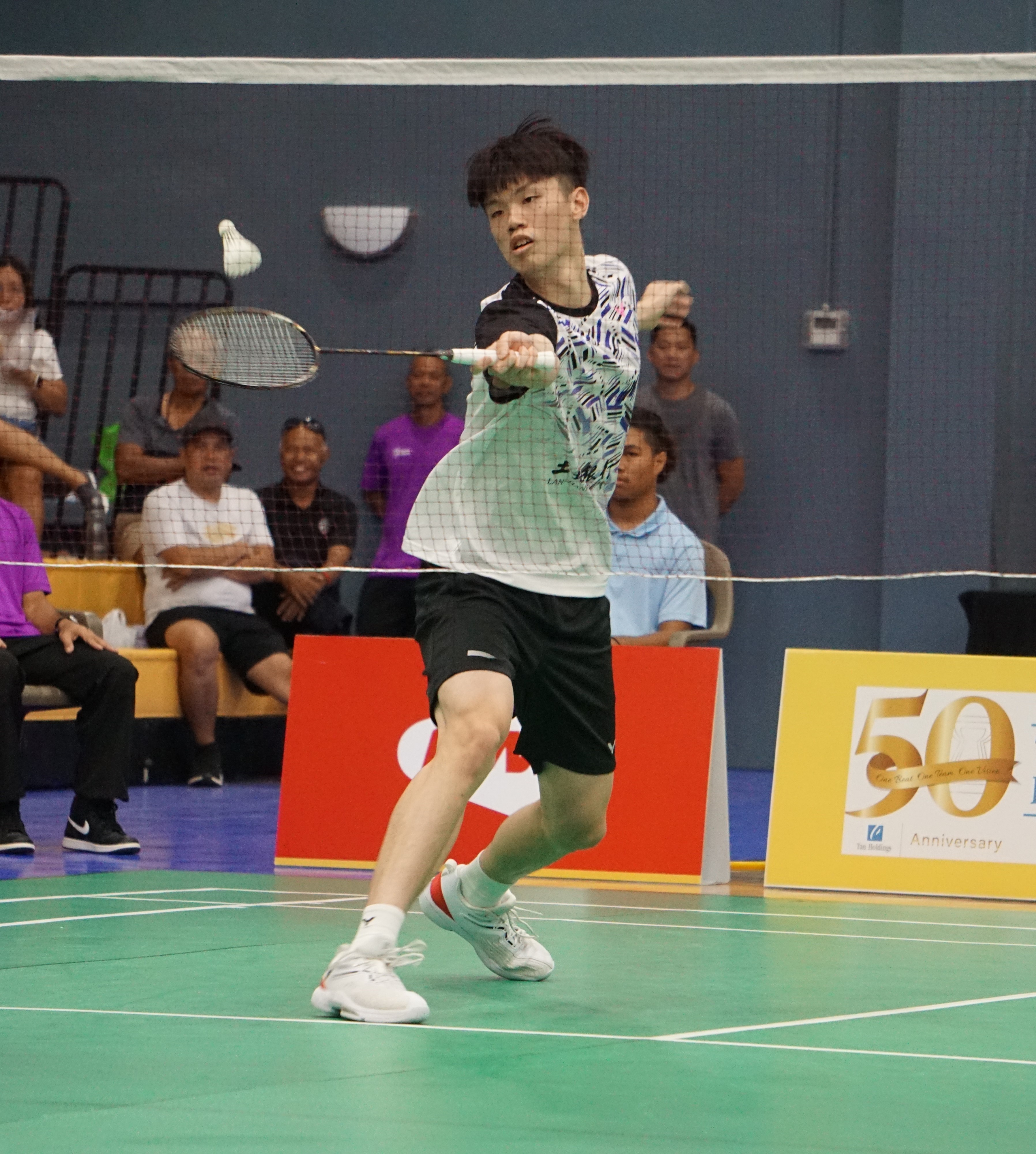 Liao Jhou-Fu of Chinese-Taipei extends for the front-hand return against South Korea's Jeon Hyeok Jind during their men’s singles championship match of the Northern Marianas Open 2023 Sunday at the Ada gym.
