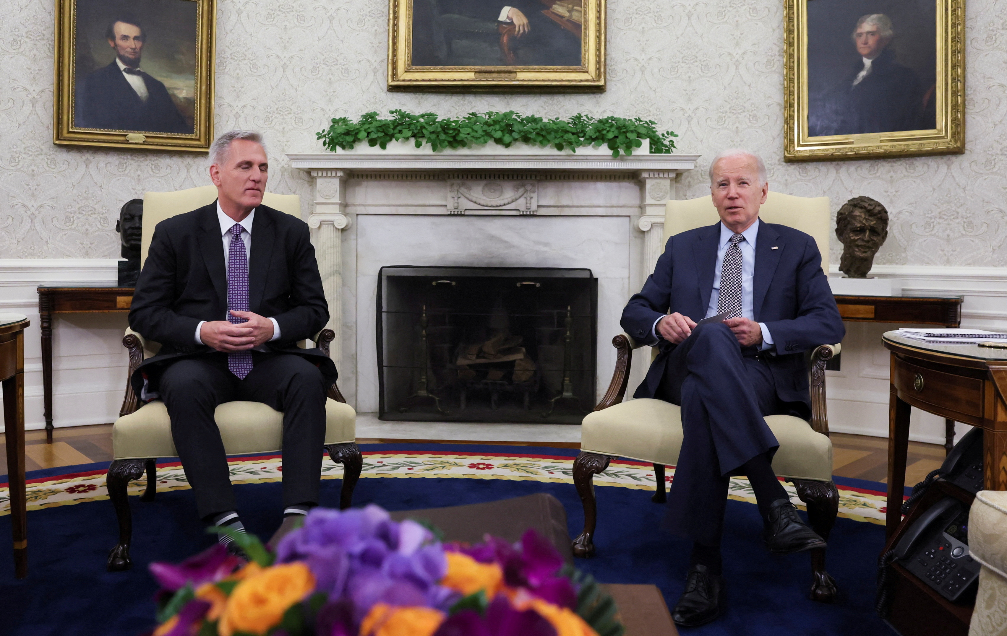 FILE PHOTO: House Speaker Kevin McCarthy (R-CA) sits for debt limit talks with U.S. President Joe Biden in the Oval Office at the White House in Washington, U.S., May 22, 2023. REUTERS/Leah Millis/File Photo