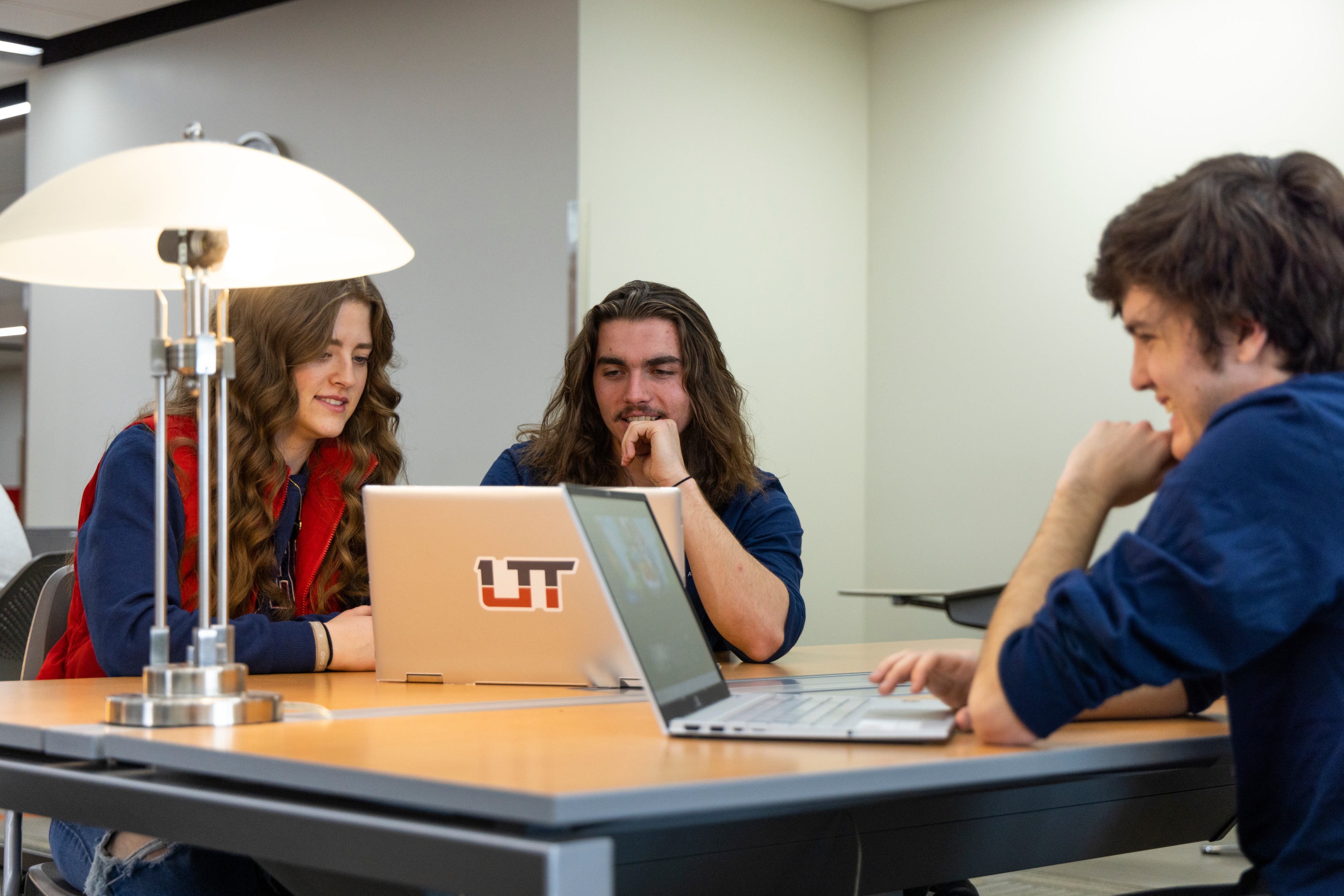 Utah Tech University students study on campus.