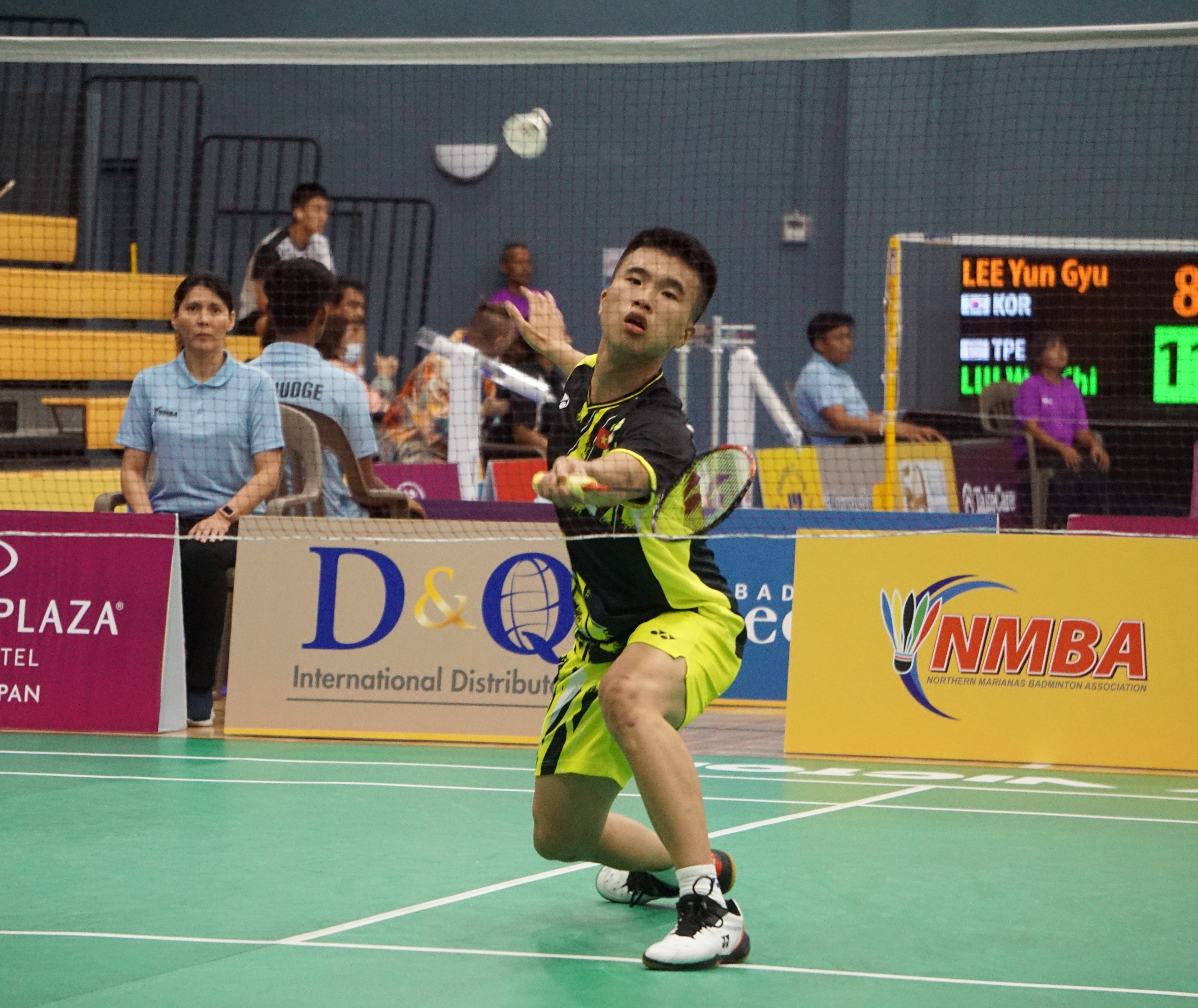 Lin Yu Hsien of Chinese-Taipei (Taiwan) extends for the lob return during a Crowne Plaza Northern Marianas Open match Monday at the Ada gym.