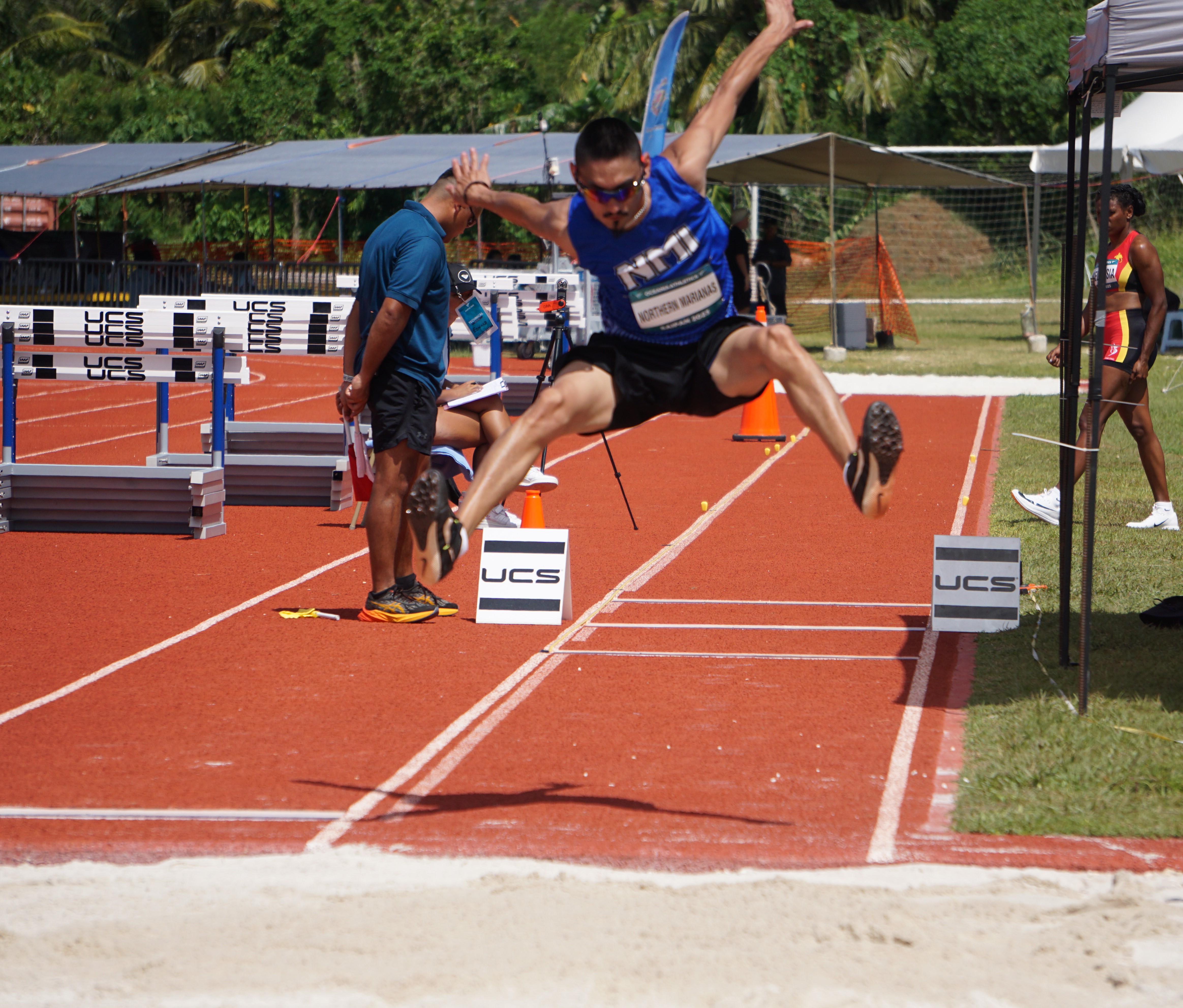Douglas Schmidt takes off for the triple jump event.