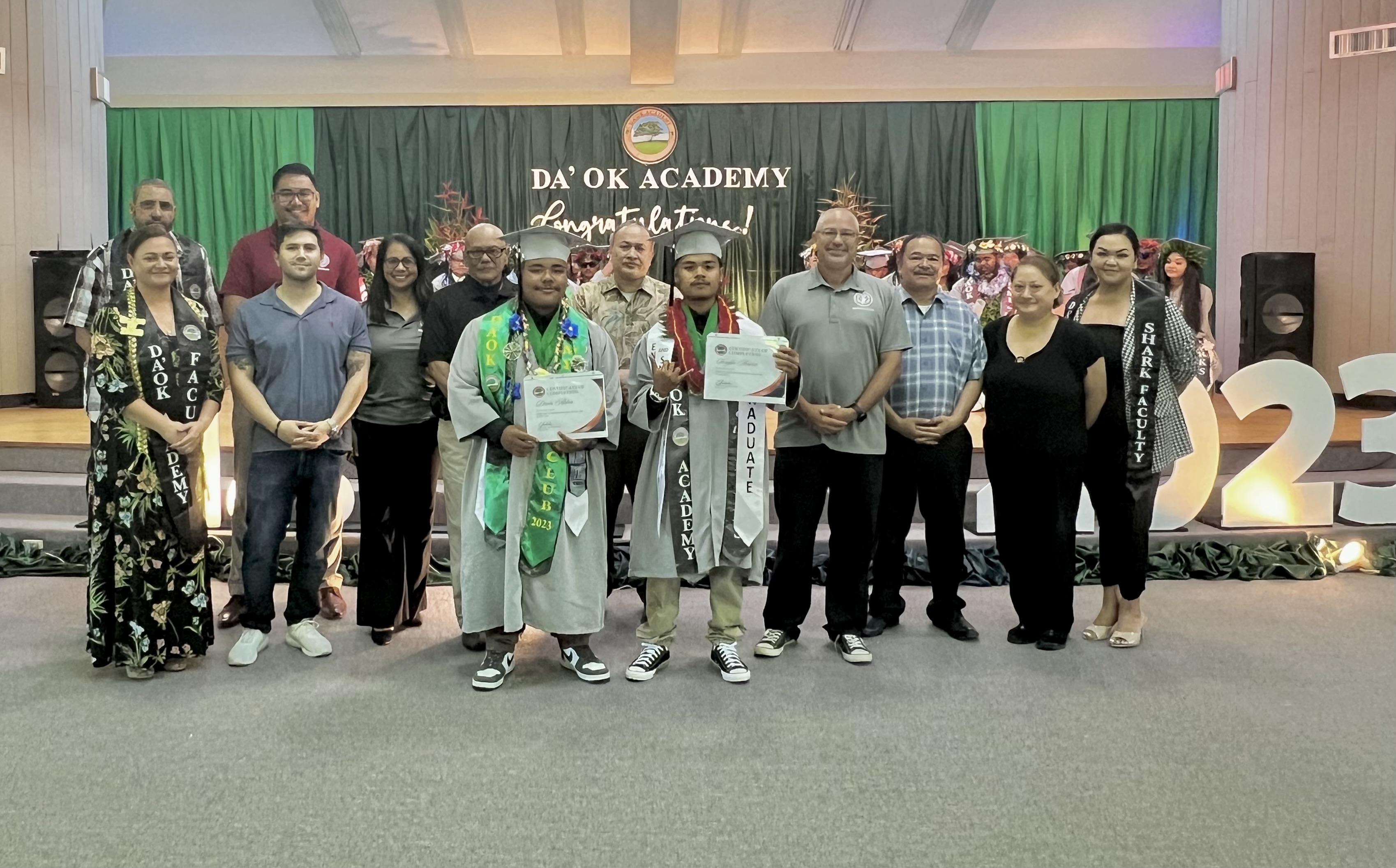 The Da’ok Academy graduates who also completed the PSS Career Technical and Education Program’s Entrepreneurship Program are Devin Aldan and Serafin Amirez. Also in photo: PSS CTE Director Dr. Jessica Taylor, Da’ok Academy Principal Christine Tudela, Board of Education Chairman Antonio L. Borja, Vice Chairman Herman Atalig, Secretary/Treasurer Gregory Pat Borja, Member Maisie B. Tenorio, Member Andrew Orsini and Commissioner of Education Dr. Alfred B. Ada.
