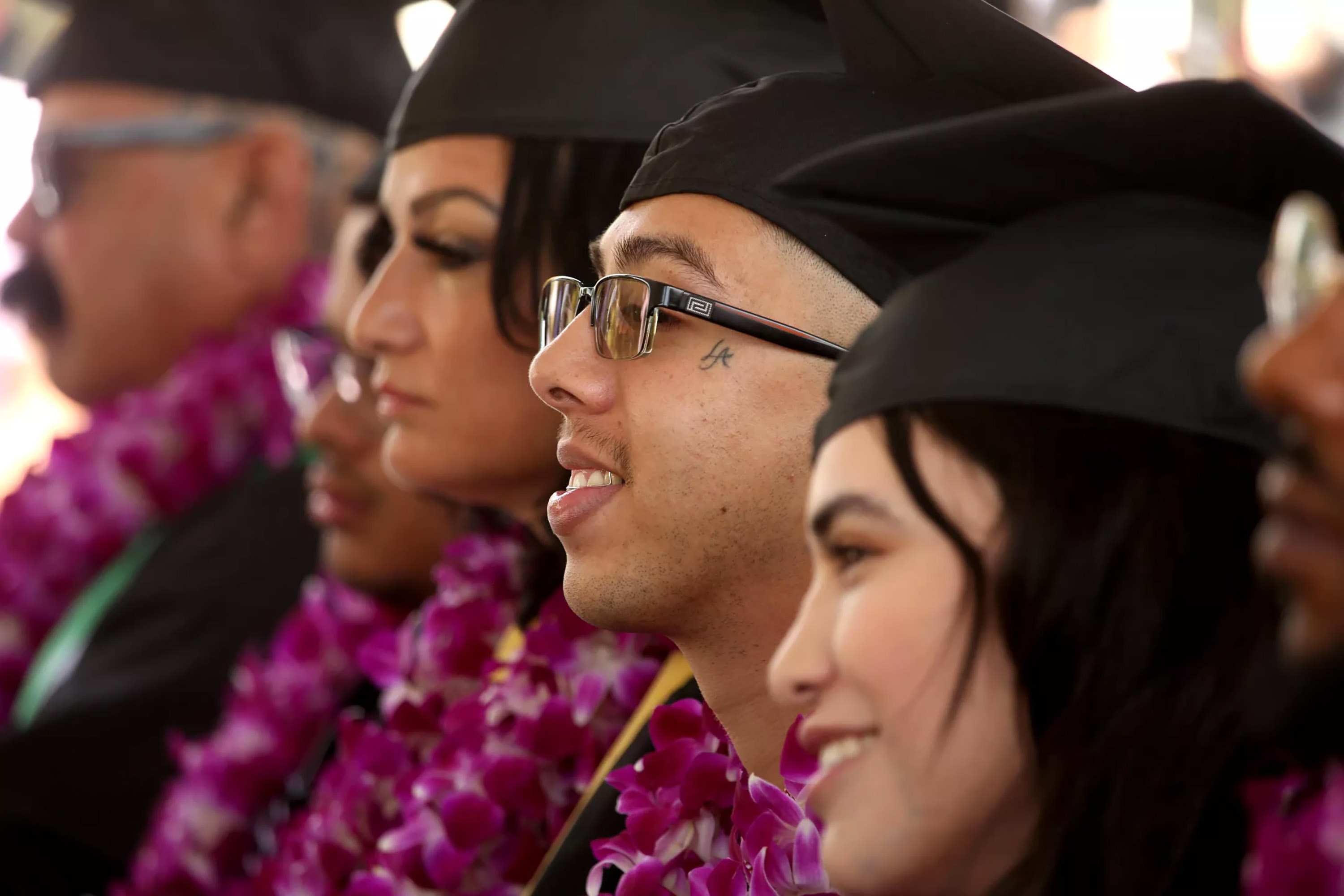 Jessi Fernandez, second from right, smiles during a celebration for Class of 2023 graduates at Homeboy Industries in Los Angeles. (Genaro Molina/Los Angeles Times/TNS)