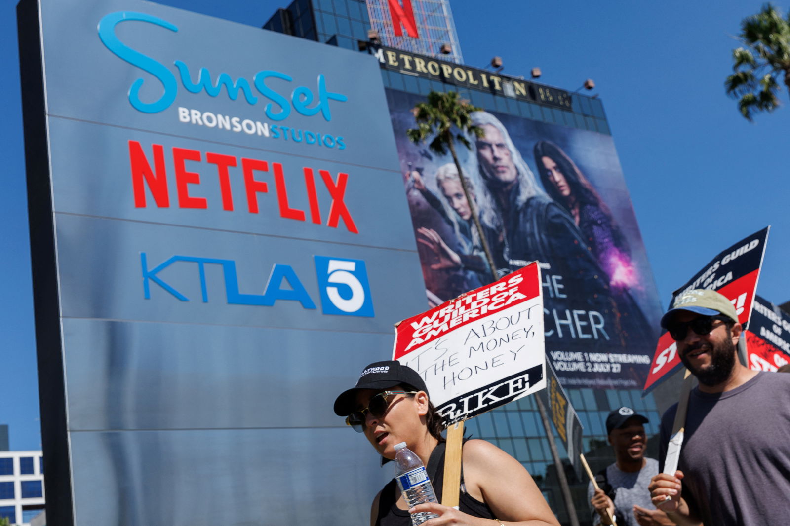 Striking Writers Guild of America (WGA) members walk the picket line in front of Netflix offices as SAG-AFTRA union announced it had agreed to a 'last-minute request' by the Alliance of Motion Picture and Television Producers for federal mediation, but it refused to again extend its existing labor contract past the 11:59 p.m. Wednesday negotiating deadline, in Los Angeles, California, U.S., July 12, 2023. REUTERS/Mike Blake