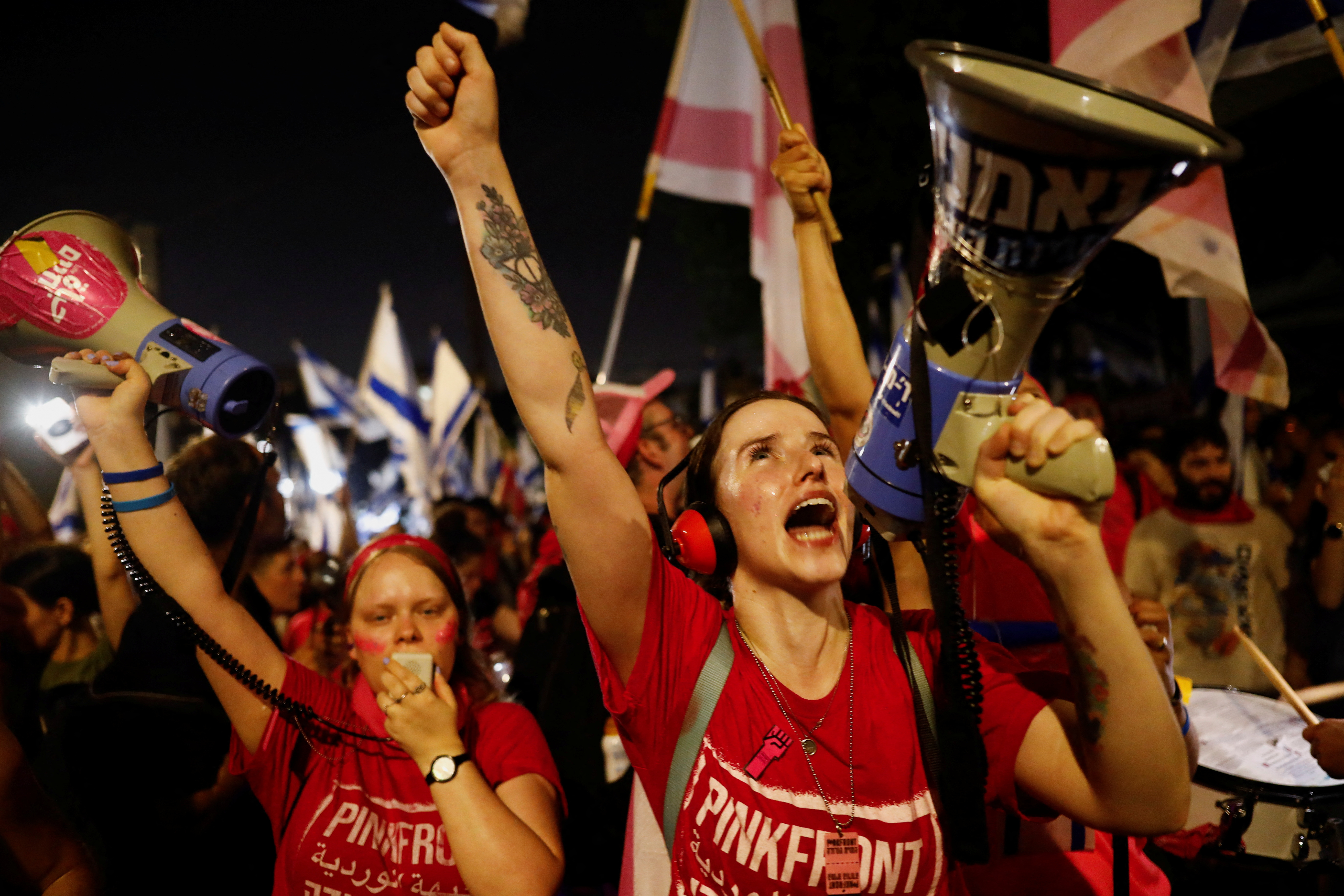 People take part in a demonstration against Israeli Prime Minister Benjamin Netanyahu and his nationalist coalition government's judicial overhaul, in Tel Aviv, Israel, July 22, 2023. REUTERS/Corinna Kern