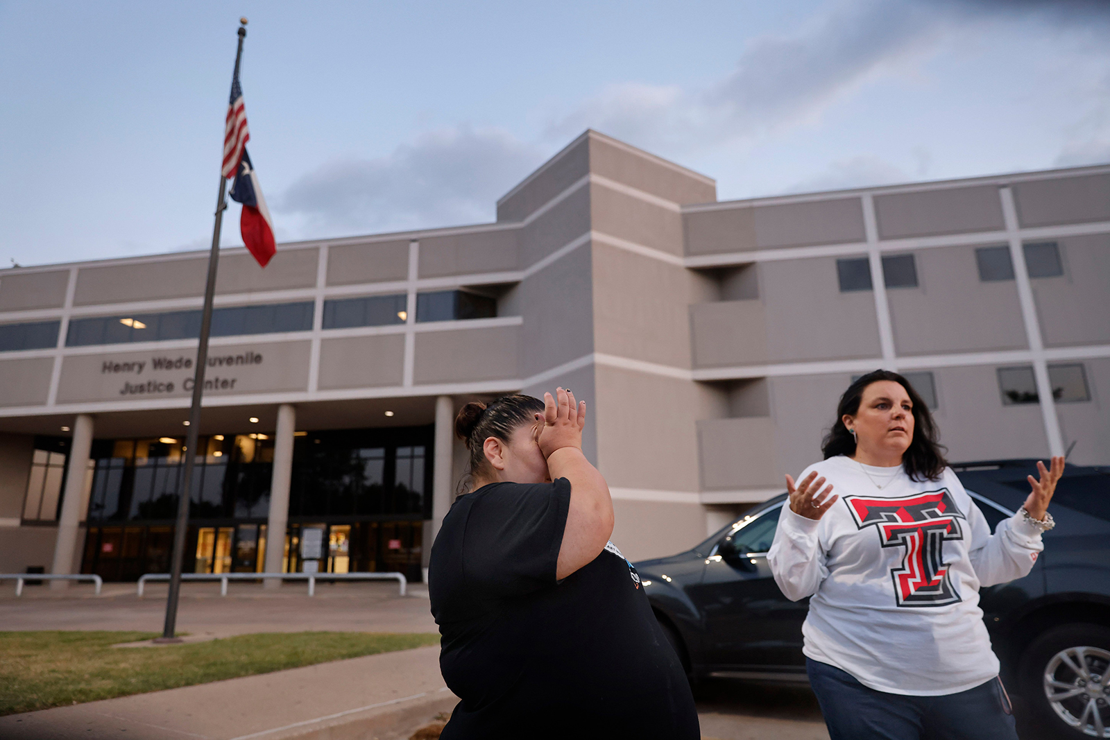 Victoria Halstead (left) wipes away after talking about her 17-year-old son being held at the Dallas County Juvenile Department inside the Henry Wade Juvenile Justice Center Dallas, April 18, 2023. She and Ashley Lively (right), a mother of a 15-year-old imprisoned boy, were speaking about what they say is poor conditions and inadequate care for the kids detained inside. (Tom Fox/Dallas Morning News/TNS)
