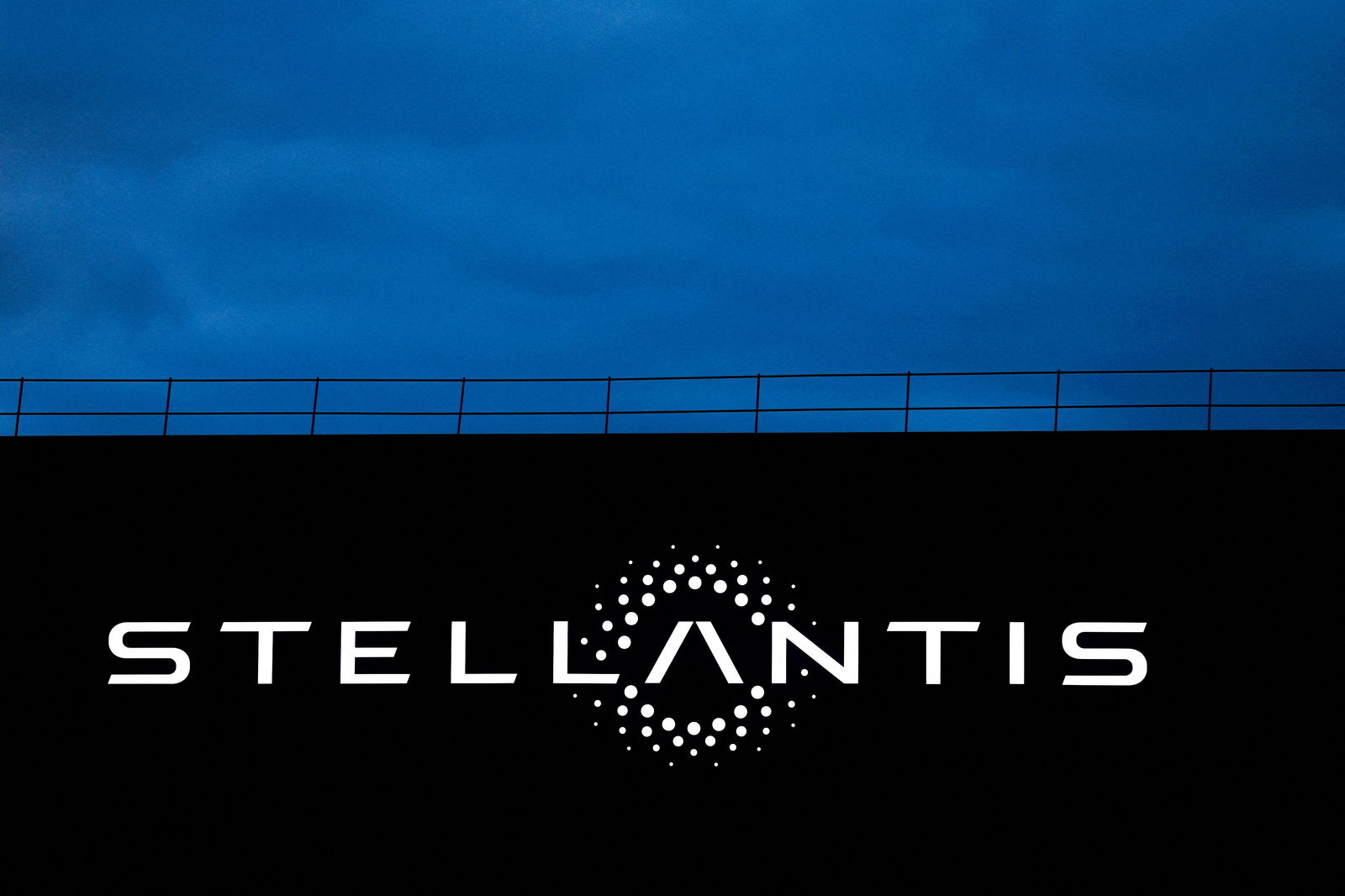 The logo of Stellantis is seen on a company's building in Velizy-Villacoublay near Paris, France, Feb. 23, 2022. REUTERS/Gonzalo Fuentes/File Photo