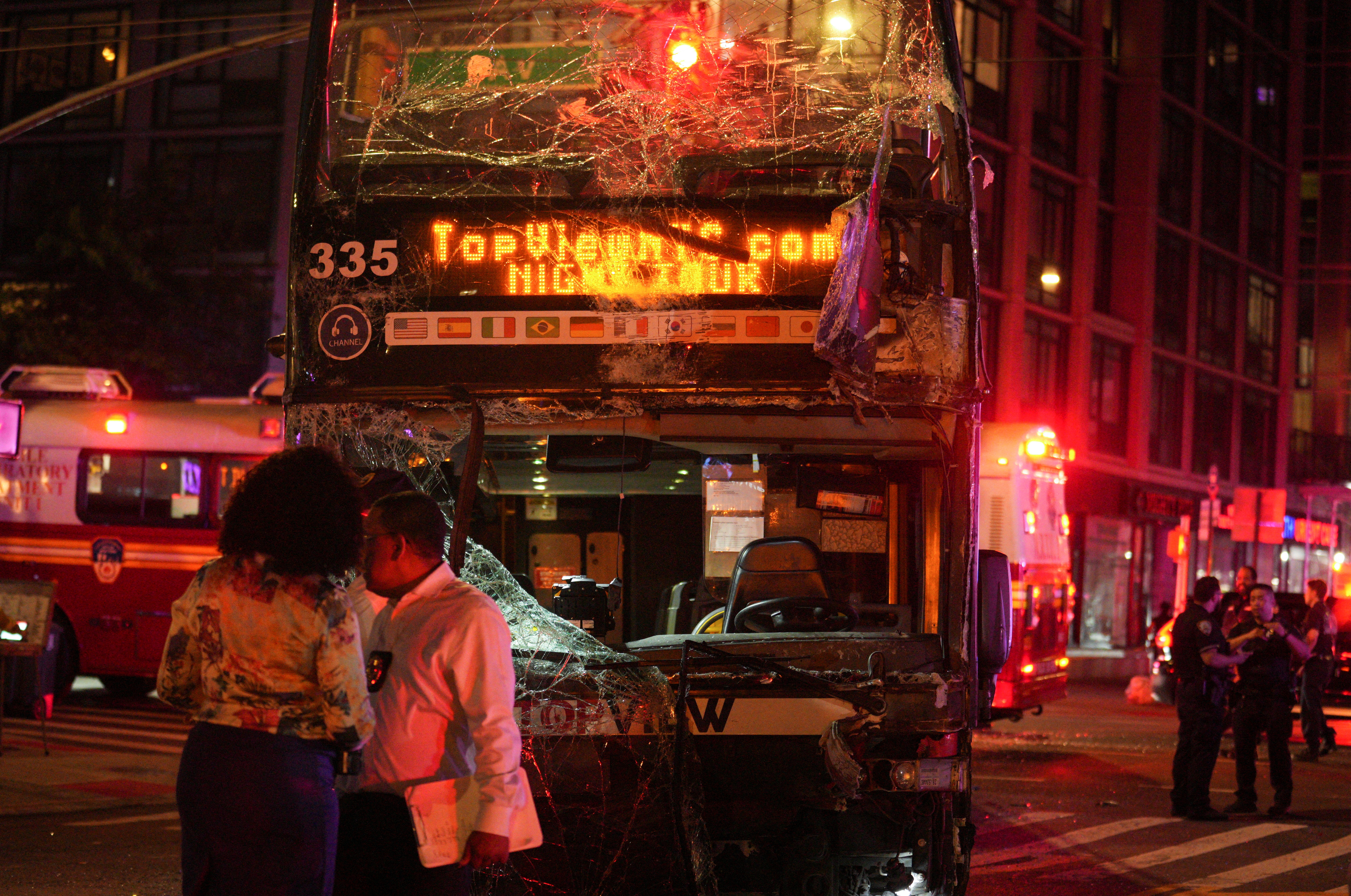 A view of the site of a bus crash between a tourist double decker bus and a city bus in the Manhattan borough of New York City, U.S., July 6, 2023. REUTERS/Jeenah Moon
