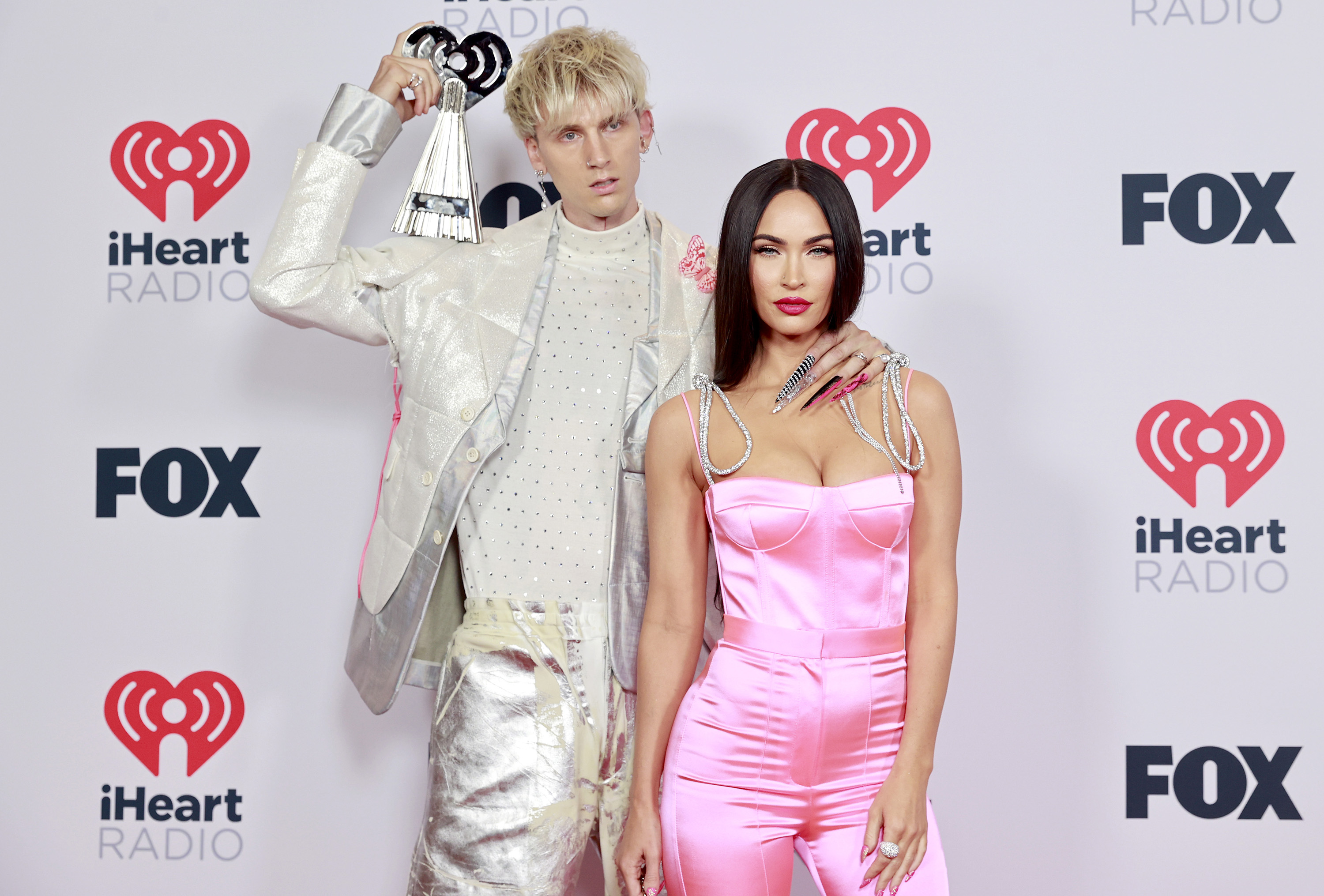Machine Gun Kelly, left, and Megan Fox attend the 2021 iHeartRadio Music Awards at the Dolby Theatre in Los Angeles on May 27, 2021. (Emma McIntyre/Getty Images for iHeartMedia/TNS)