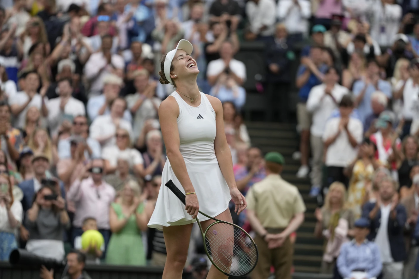 Ukraine’s Elina Svitolina celebrates after beating Poland’s Iga Swiatek to win their women’s singles match on day nine of the Wimbledon tennis championships in London, Tuesday, July 11, 2023.