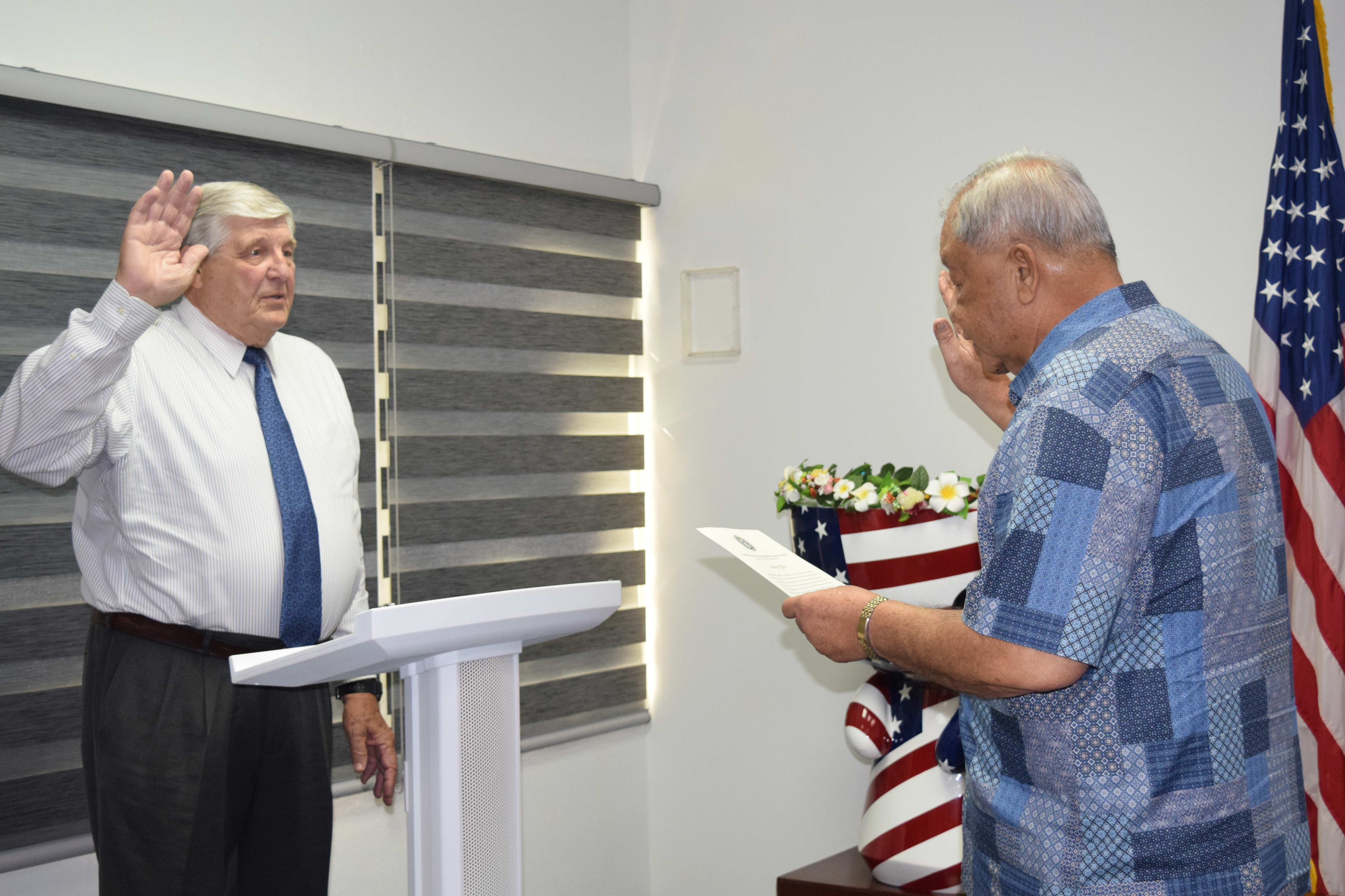 Lt. Gov. David M. Apatang swears in James Sirok.