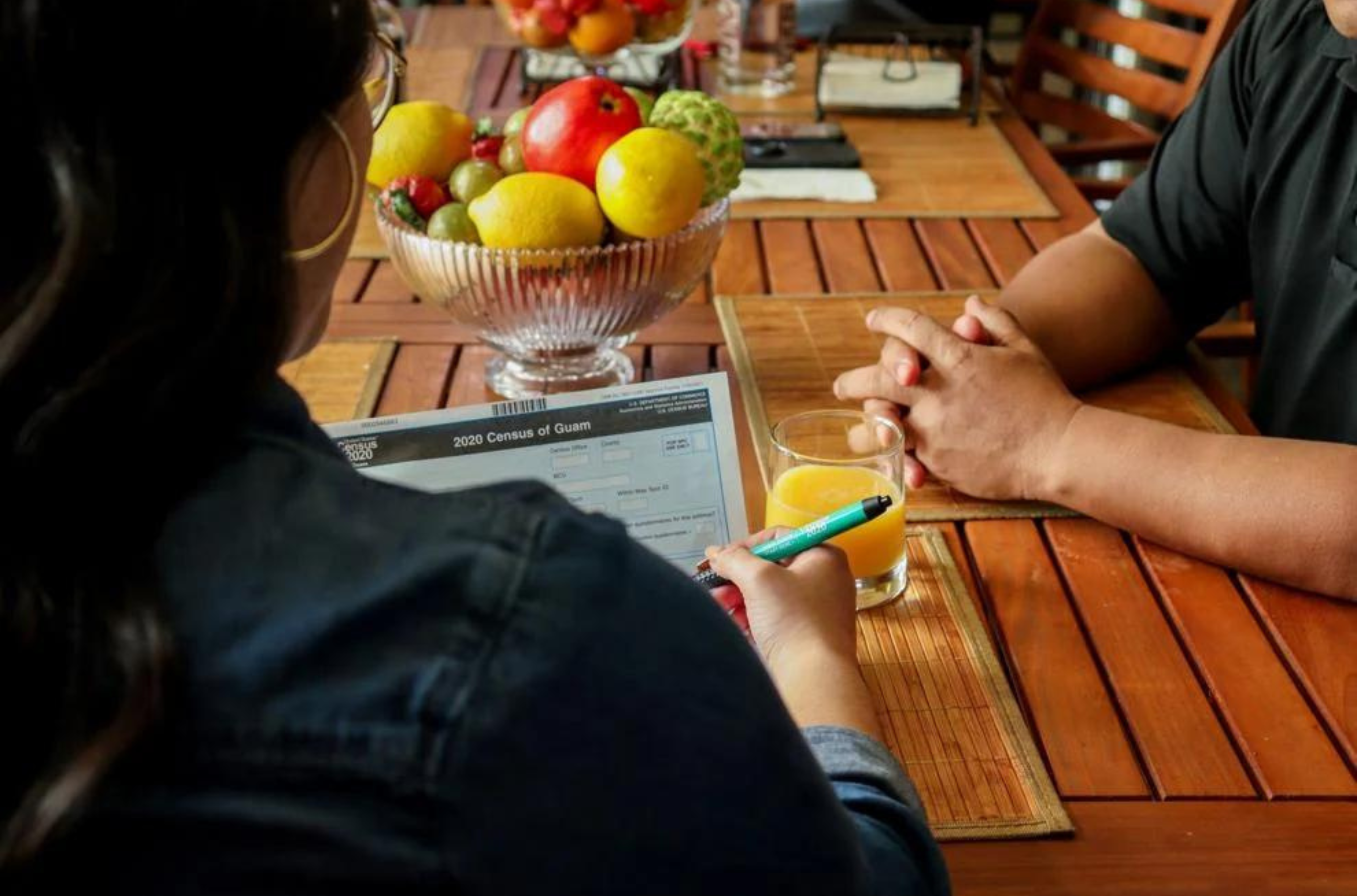 An enumerator with the 2020 Census of Guam conducts an in-person interview in this courtesy photo. About 1 in 5 people surveyed in the 2020 Island Area Census of Guam were living below the poverty line, according to newly released data.