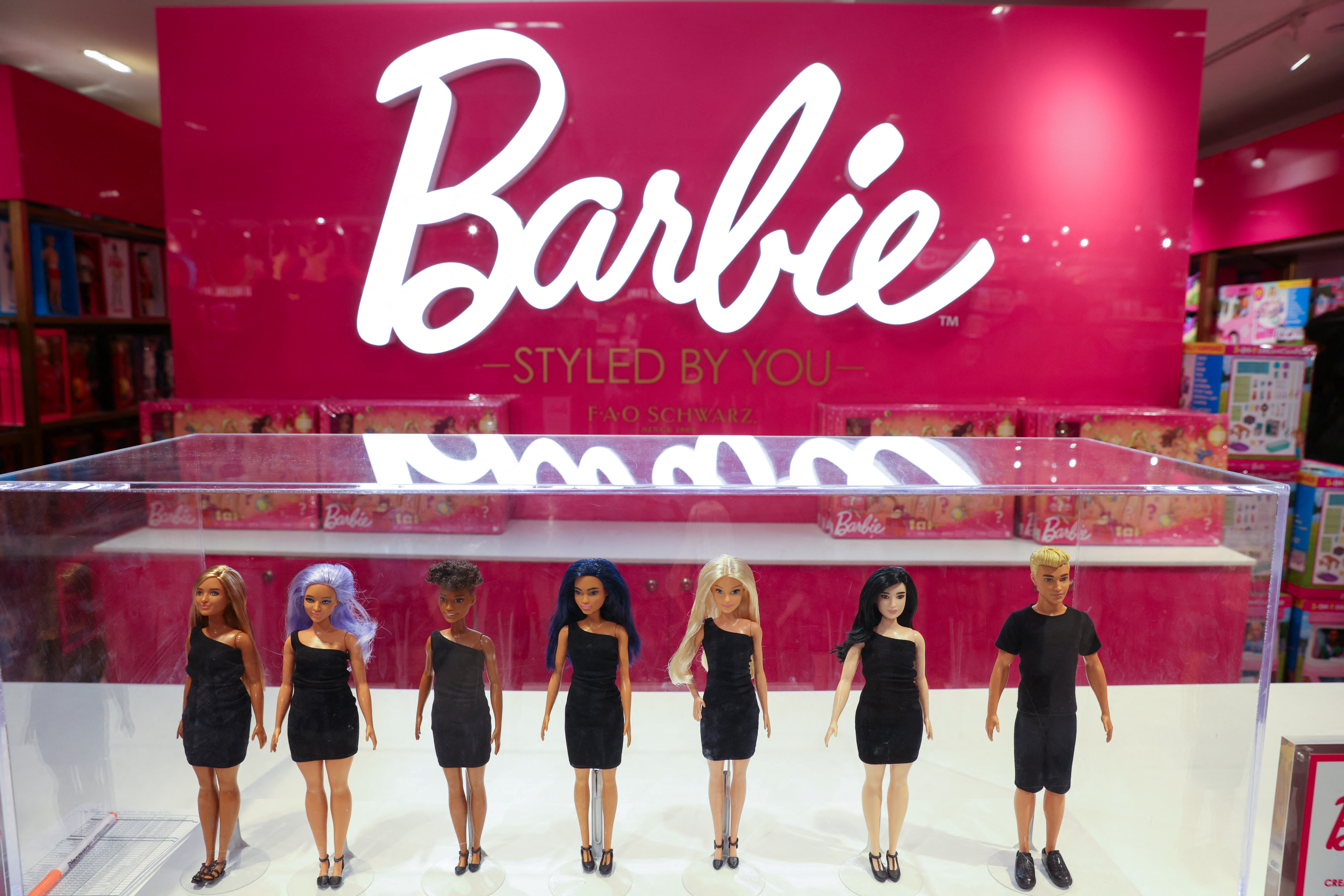 Barbie dolls, a brand owned by Mattel, are seen at the FAO Schwarz toy store in Manhattan, New York City, U.S., November 24, 2021. REUTERS/Andrew Kelly/ File Photo