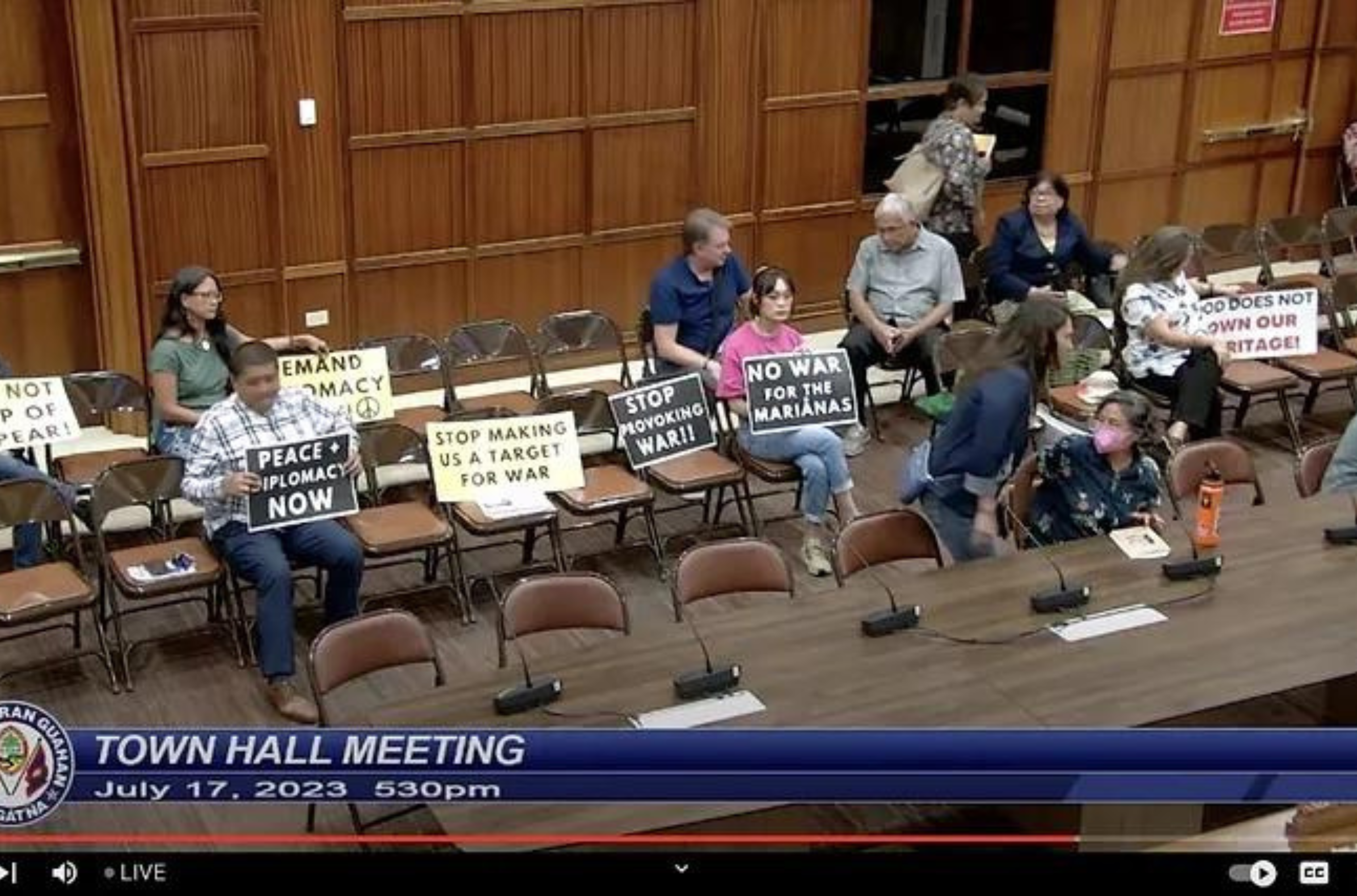 Attendees and protesters in the legislative town hall meeting