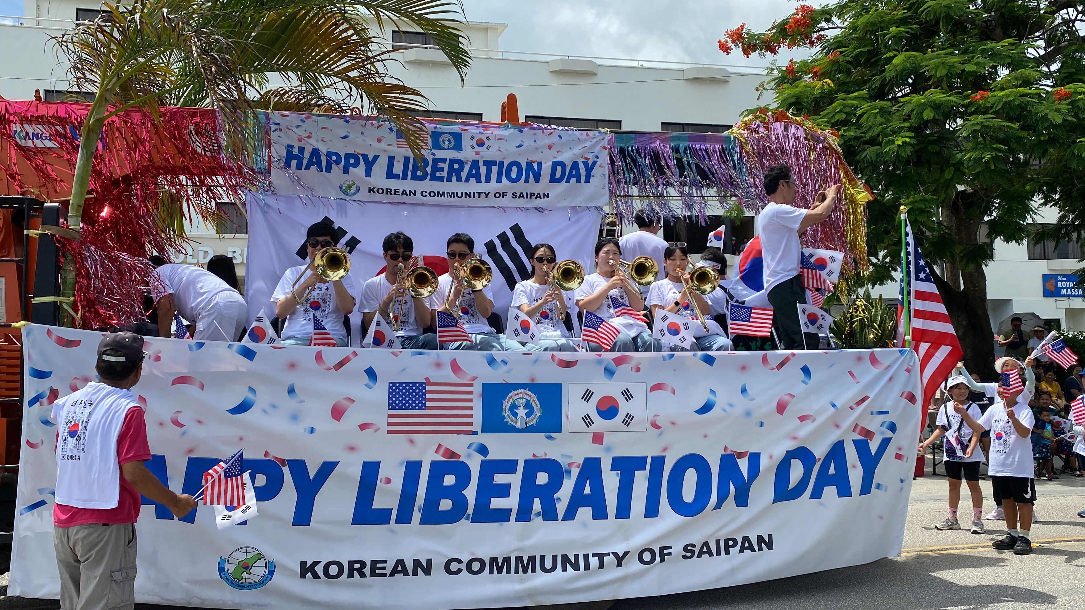 The Korean Community of Saipan had an entire trombone ensemble as part of their float.