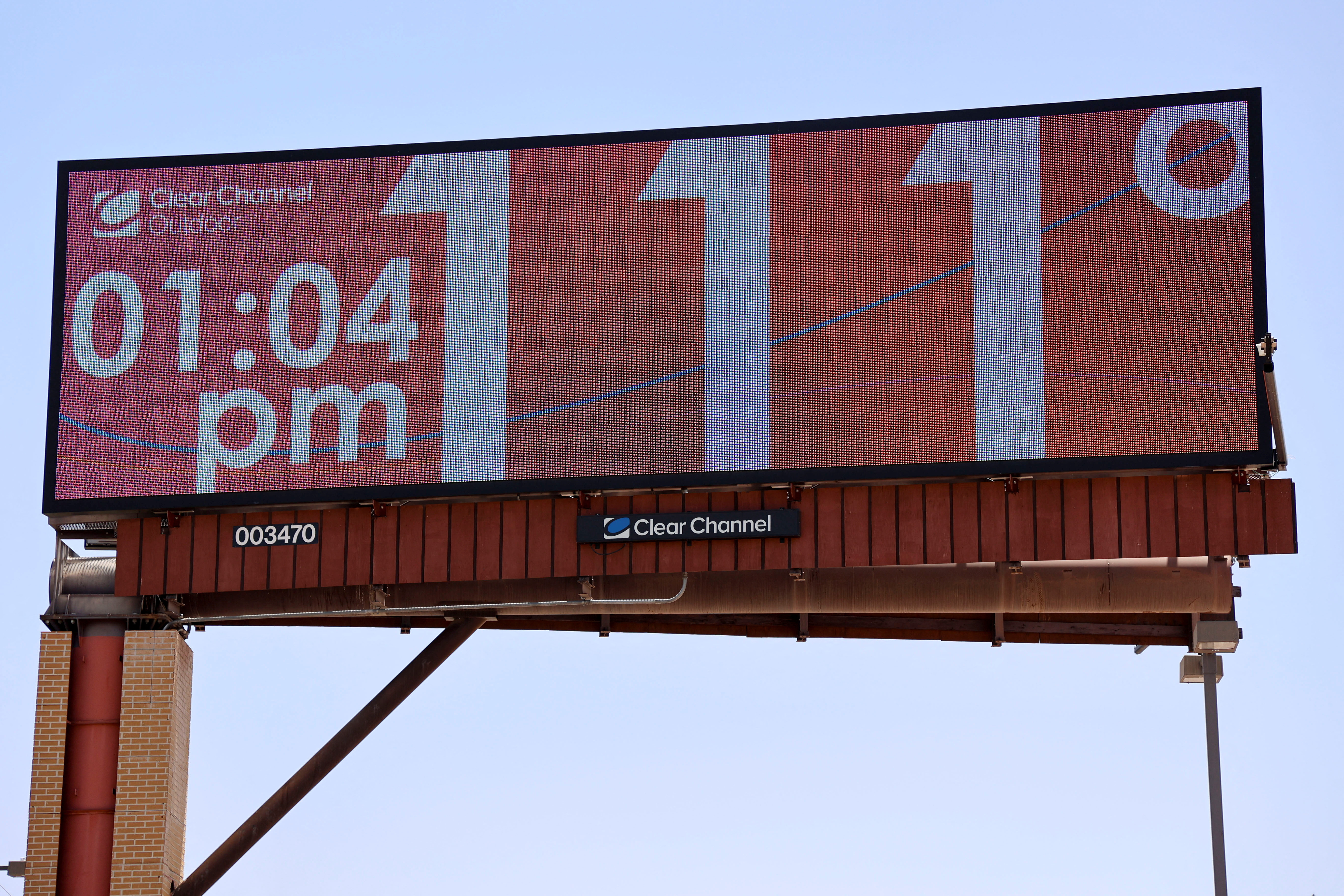 Billboard displays temperature as Phoenix breaks heat record of 19 consecutive days above 110 degrees Fahrenheit, in Phoenix, Arizona, U.S., July 18, 2023. REUTERS/Liliana Salgado