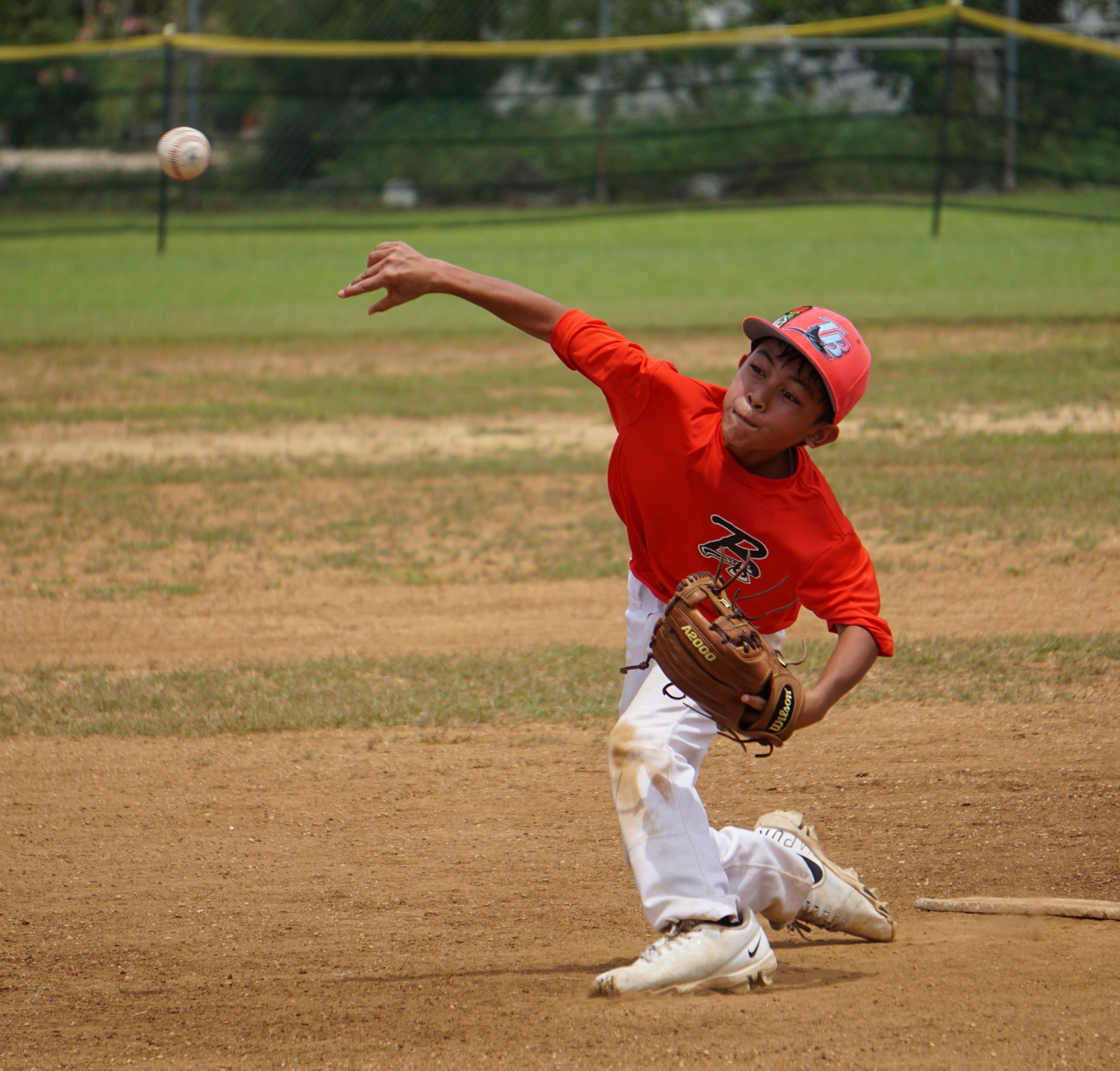 The Braves' Dam Merchades pitches against the Blue Jays in the opening game of the Saipan Baseball League U12 Tournament  at the Miguel "Tan Ge" Pangelinan Baseball Field.