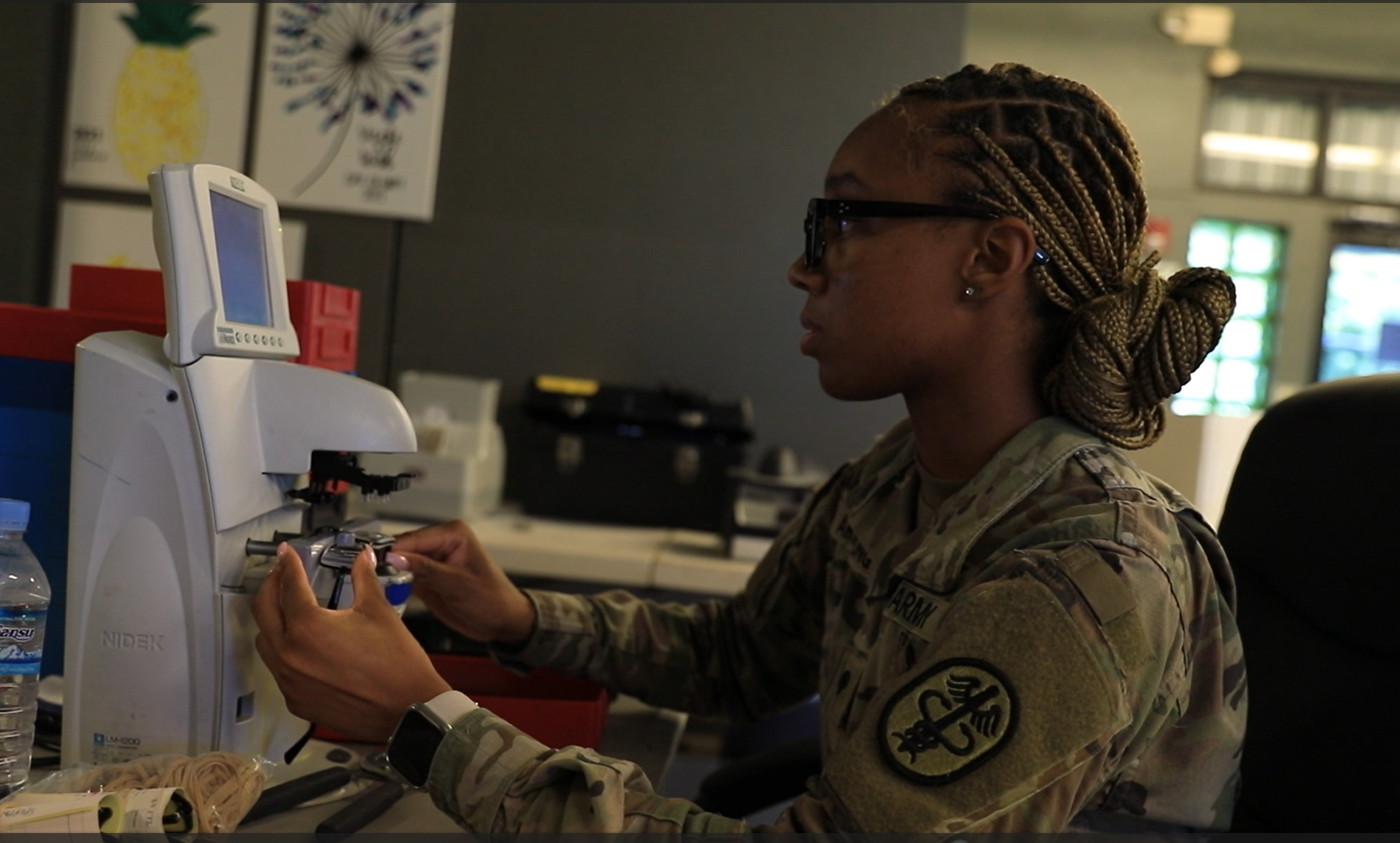 An Army optician performs the final check on eyeglasses fabricated at no cost to the community on Saipan during the Innovative Readiness Training-Operation Wellness CNMI on July 16.