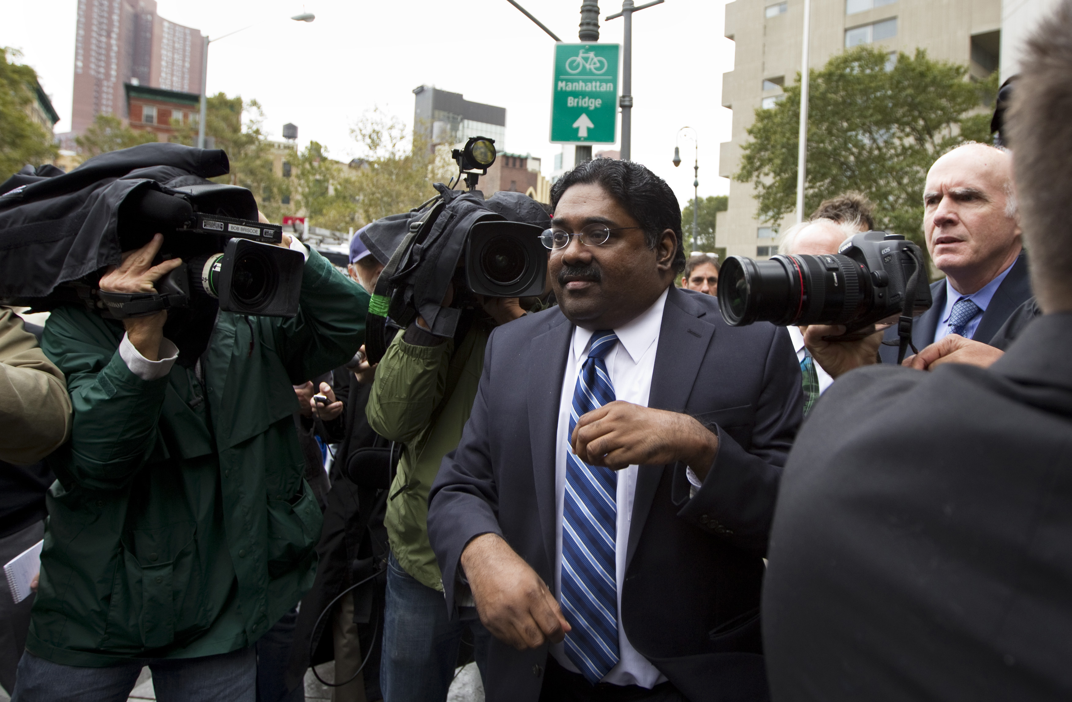 Galleon hedge fund founder Raj Rajaratnam departs Manhattan Federal Court after his sentencing in New York October 13, 2011. REUTERS/Lucas Jackson/File Photo