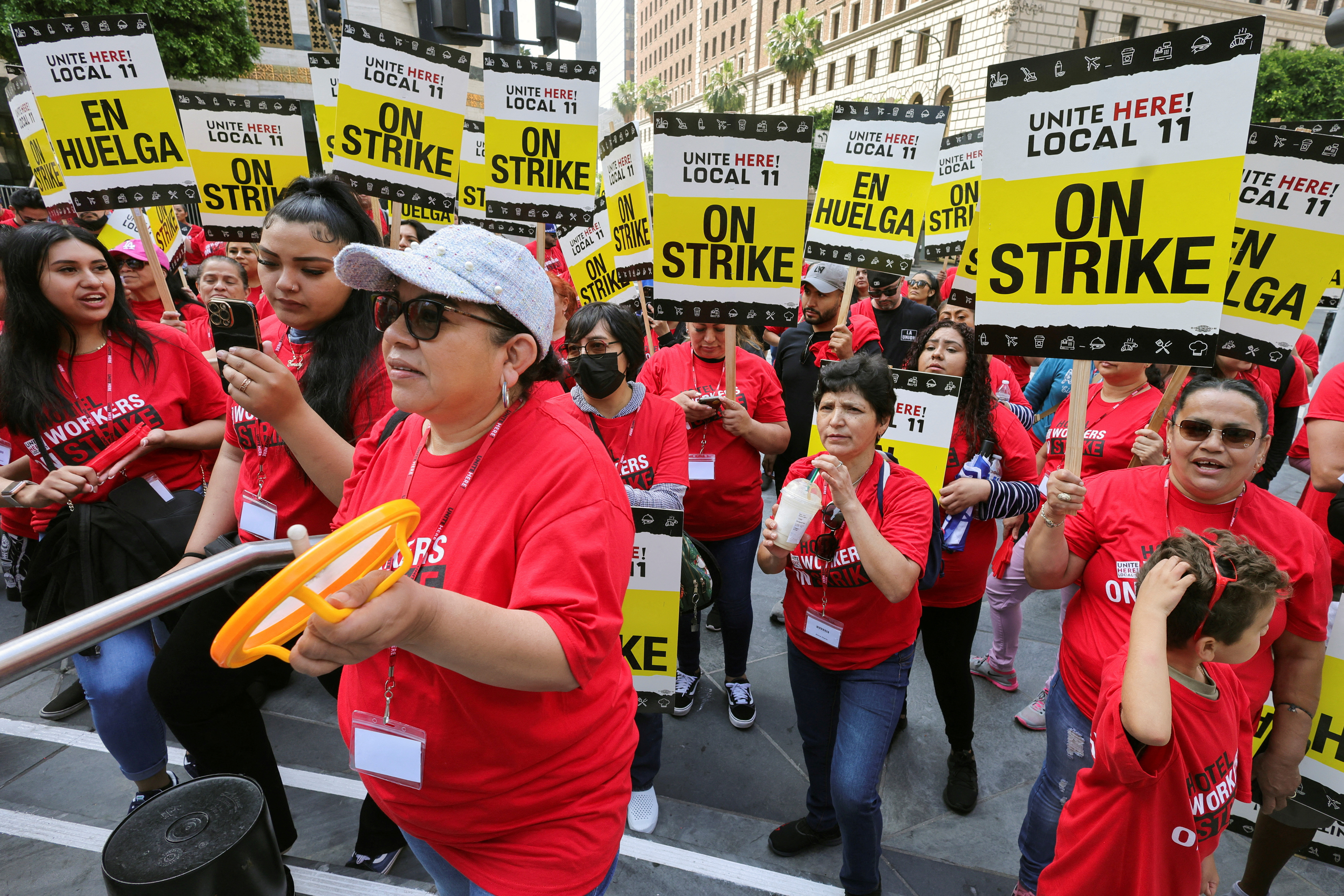 People protest in front of InterContinental Hotel as unionized hotel workers in Los Angeles and Orange County go on strike, in Los Angeles, California, U.S. July 2, 2023. 