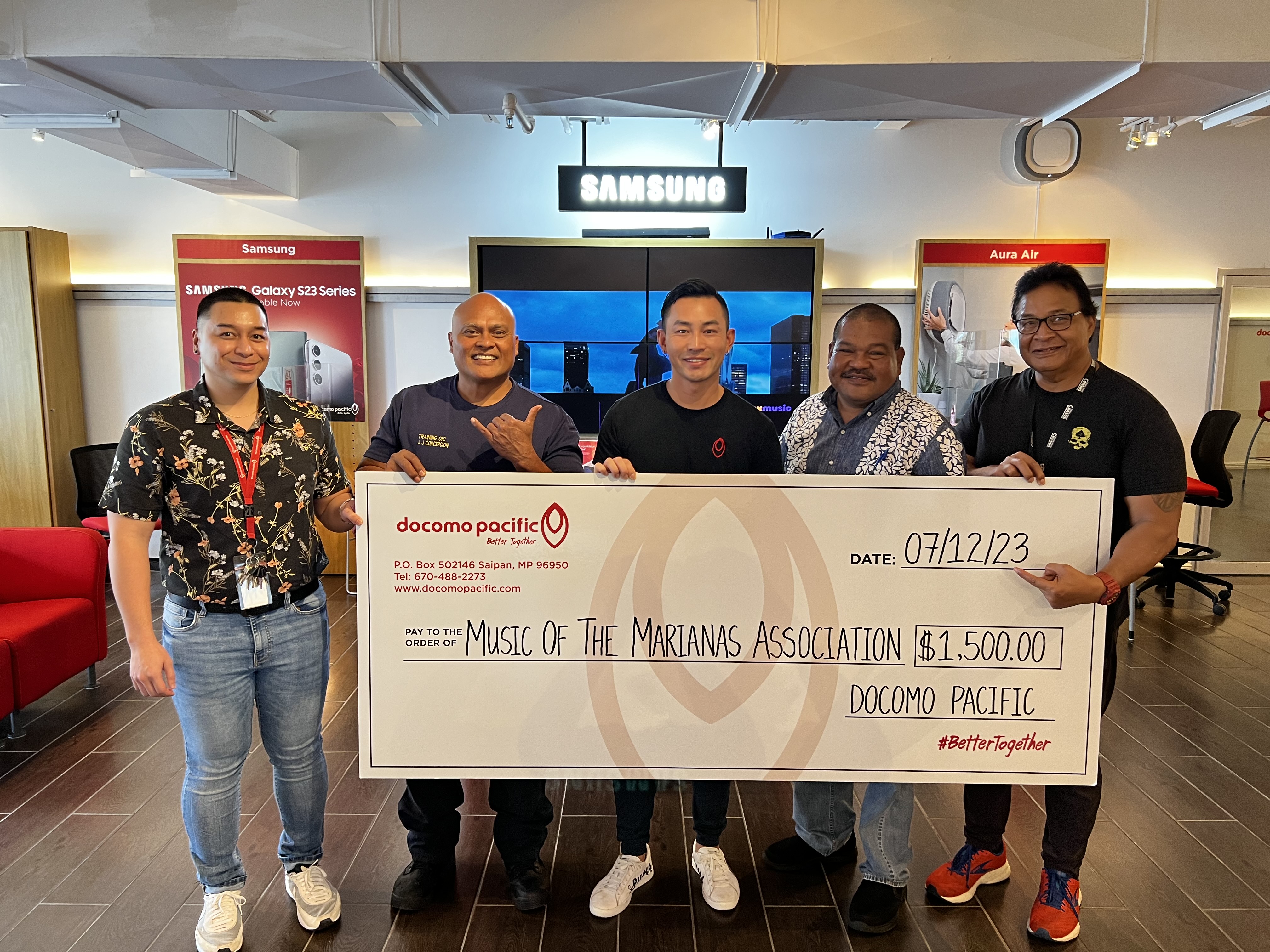 From left, Brent Deleon Guerrero, brand manager, Docomo Pacific; JJ Concepcion, president, Music of the Marianas Association; Justin Yu, customer service representative, Docomo Pacific; Ross Manglona, resident executive, Indigenous Affairs Office; and Gus Litulumar, treasurer, Music of the Marianas Association.