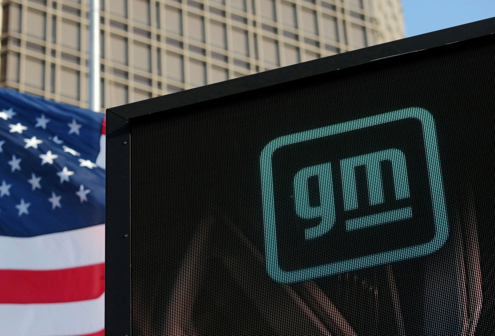 The new GM logo is seen on the facade of the General Motors headquarters in Detroit, Michigan, U.S., March 16, 2021. REUTERS/Rebecca Cook/File Photo