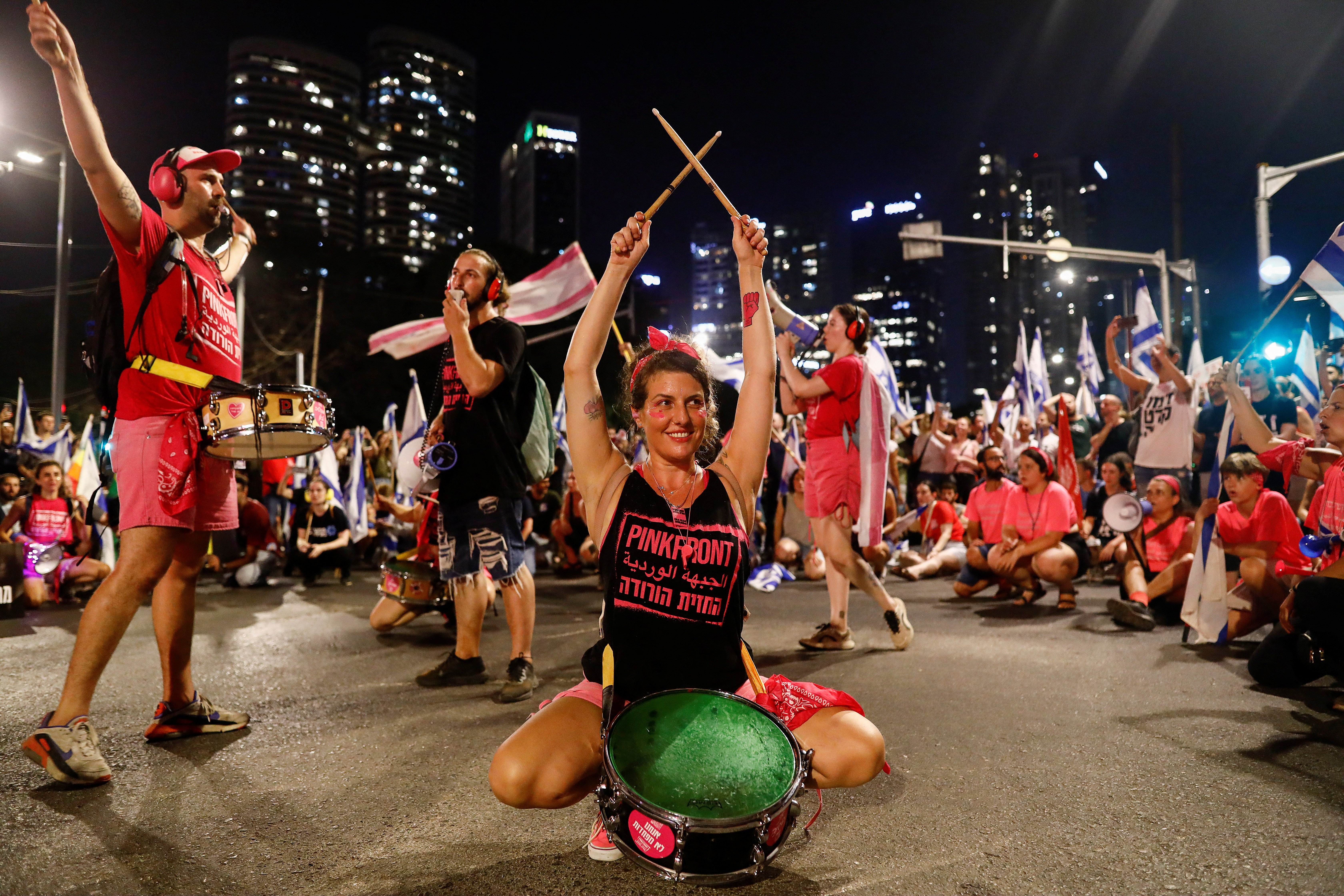 People take part in a demonstration against Israeli Prime Minister Benjamin Netanyahu and his nationalist coalition government's judicial overhaul, in Tel Aviv, Israel, July 22, 2023. REUTERS/Corinna Kern