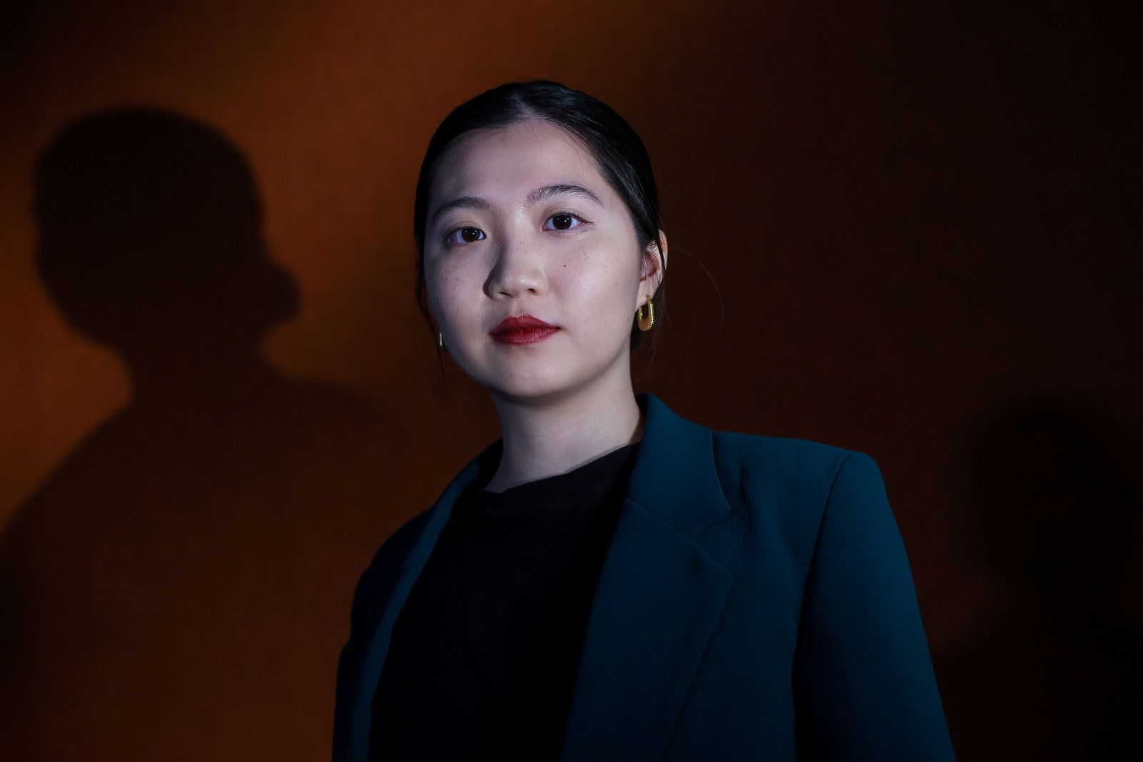 Anna Kwok, 26, a Washington D.C. based Hong Kong activist, who has been designated by the Hong Kong police as a fugitive with a $1 million dollar bounty offered for her arrest, is photographed during an interview at the Reuters bureau in Washington, DC, U.S., July 10, 2023. REUTERS/Evelyn Hockstein