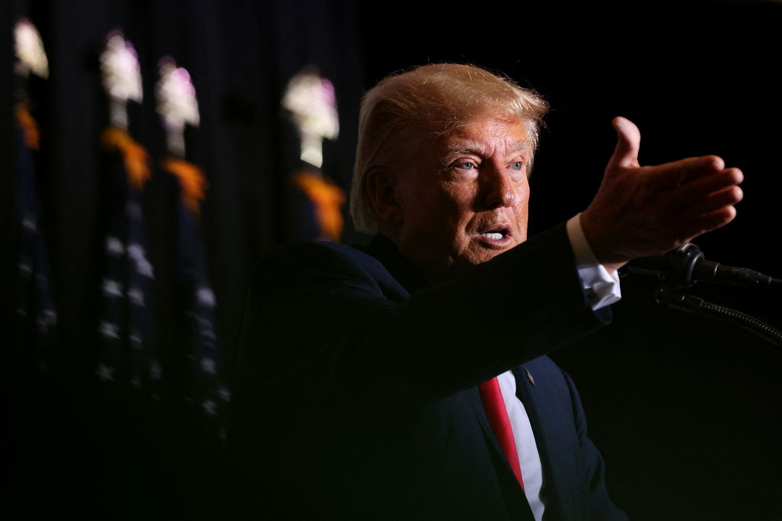 Former U.S. President and Republican presidential candidate Donald Trump speaks at a campaign event in Council Bluffs, Iowa, U.S., July 7, 2023. REUTERS/Scott Morgan/File Photo