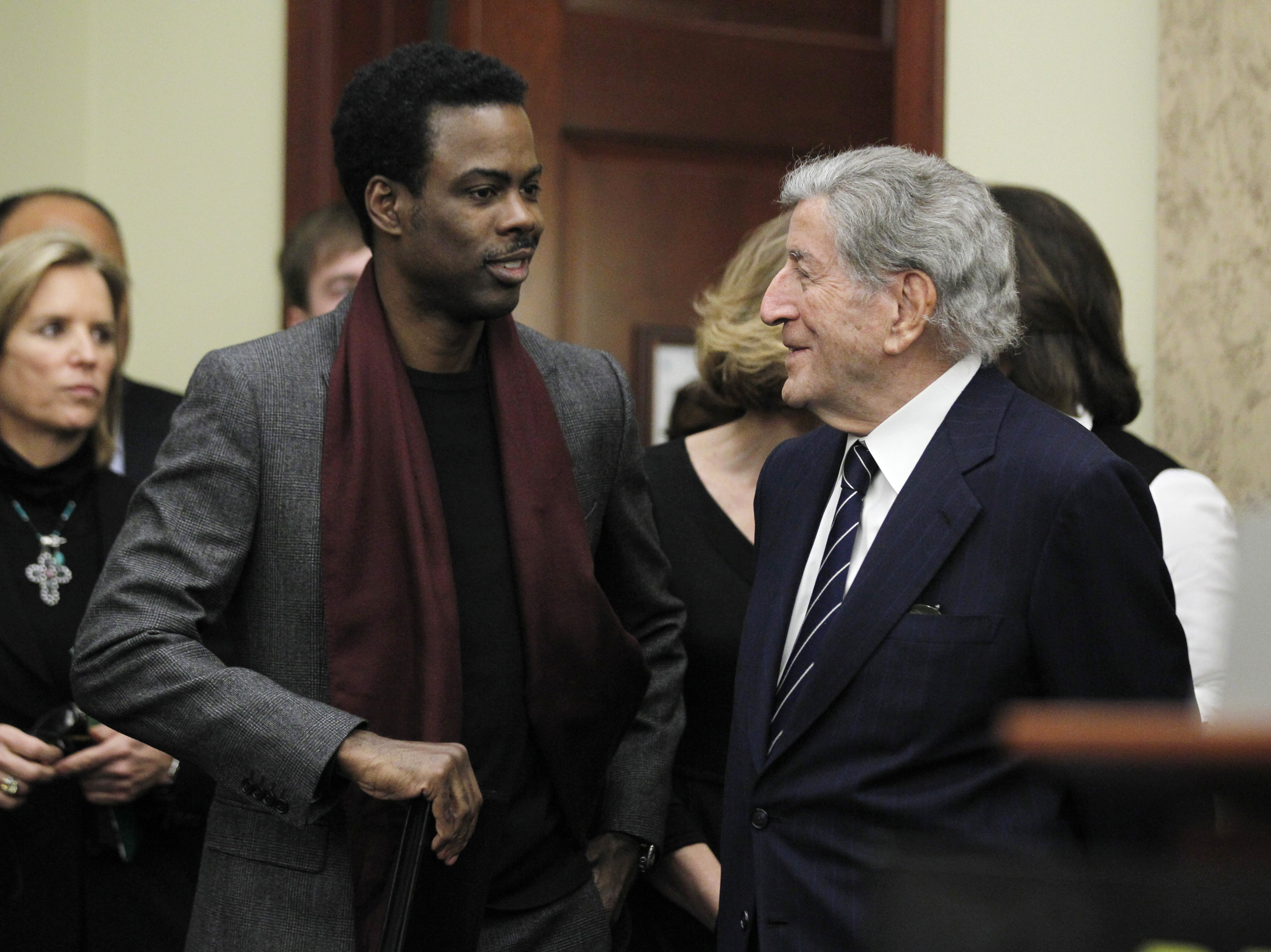 FILE PHOTO: Entertainer Chris Rock and singer Tony Bennett are pictured during an event to call on congress to back President Barack Obama's plan to reduce gun violence, on Capitol Hill in Washington, February 6, 2013. REUTERS/Jason Reed/File Photo