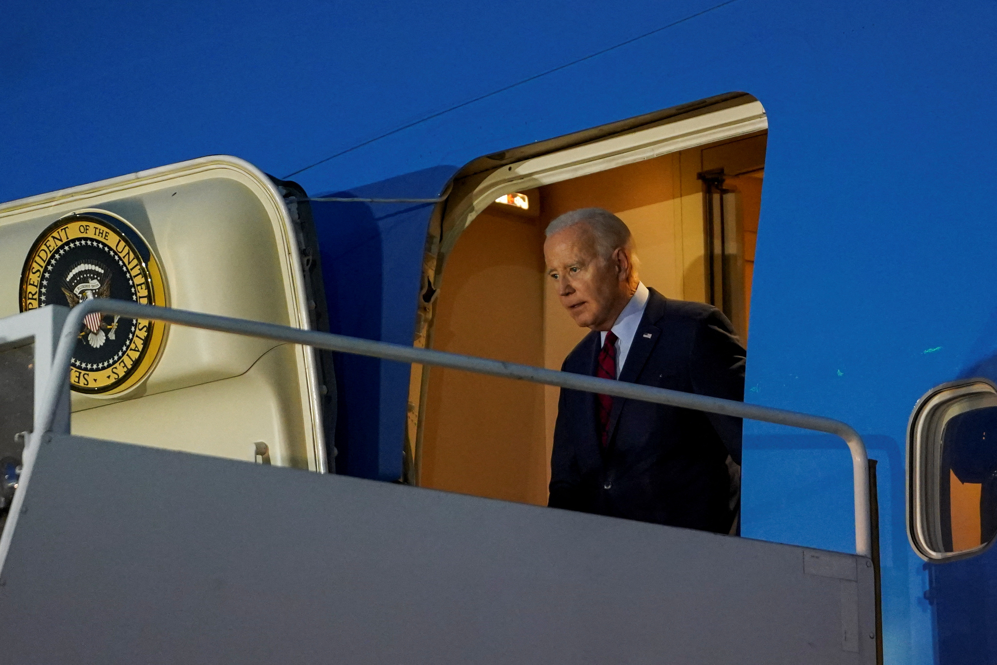 U.S. President Joe Biden disembarks Air Force One as he visits Britain, at Stansted Airport, Britain, July 9, 2023. REUTERS/Kevin Lamarque