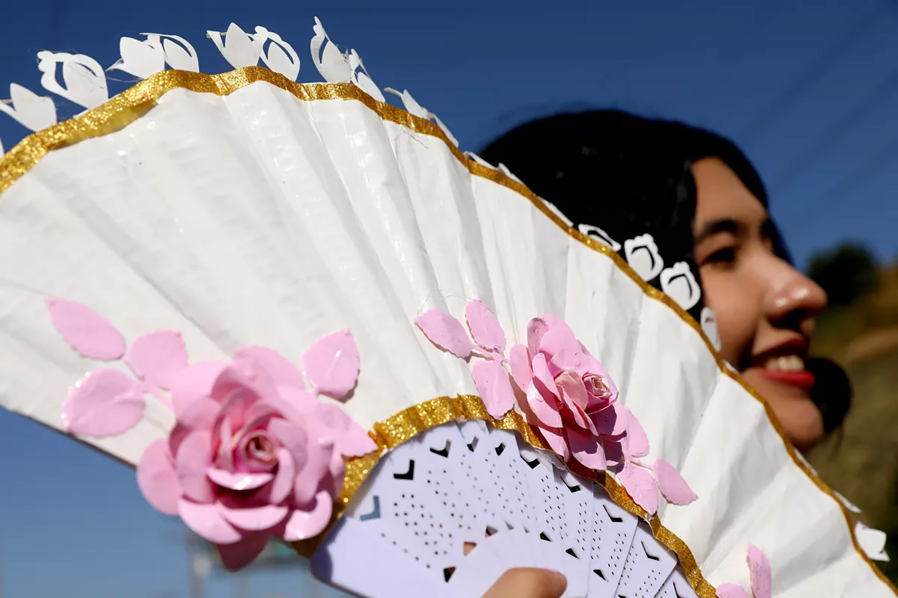 Intricately-cut details adorn all elements of Torresâ€™ design, which included the 18th century-inspired, dress, a purse and a fan.(Gary Coronado/Los Angeles Times/TNS)