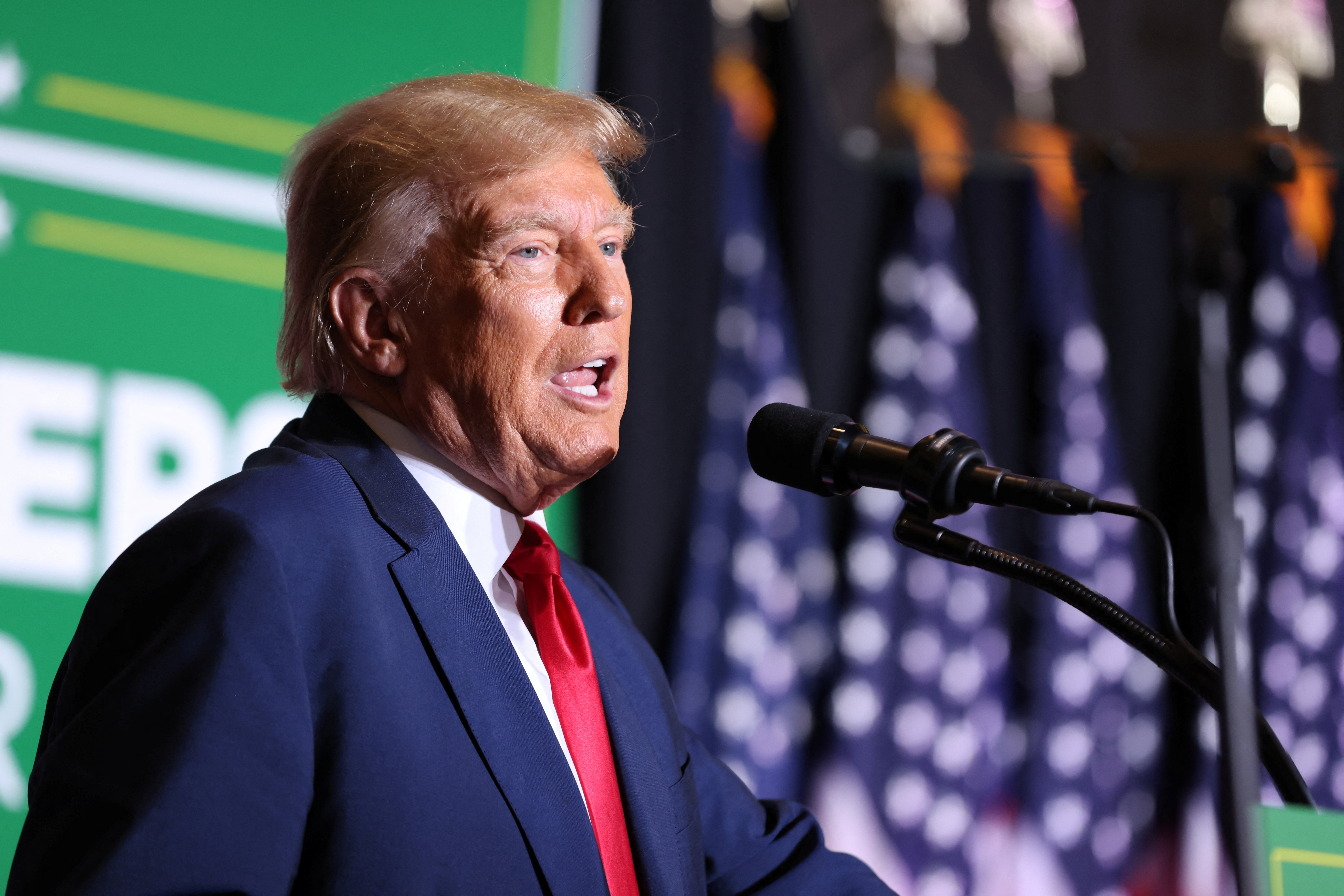 Former U.S. President and Republican presidential candidate Donald Trump speaks at a campaign event in Council Bluffs, Iowa, U.S., July 7, 2023. REUTERS/Scott Morgan/File Photo