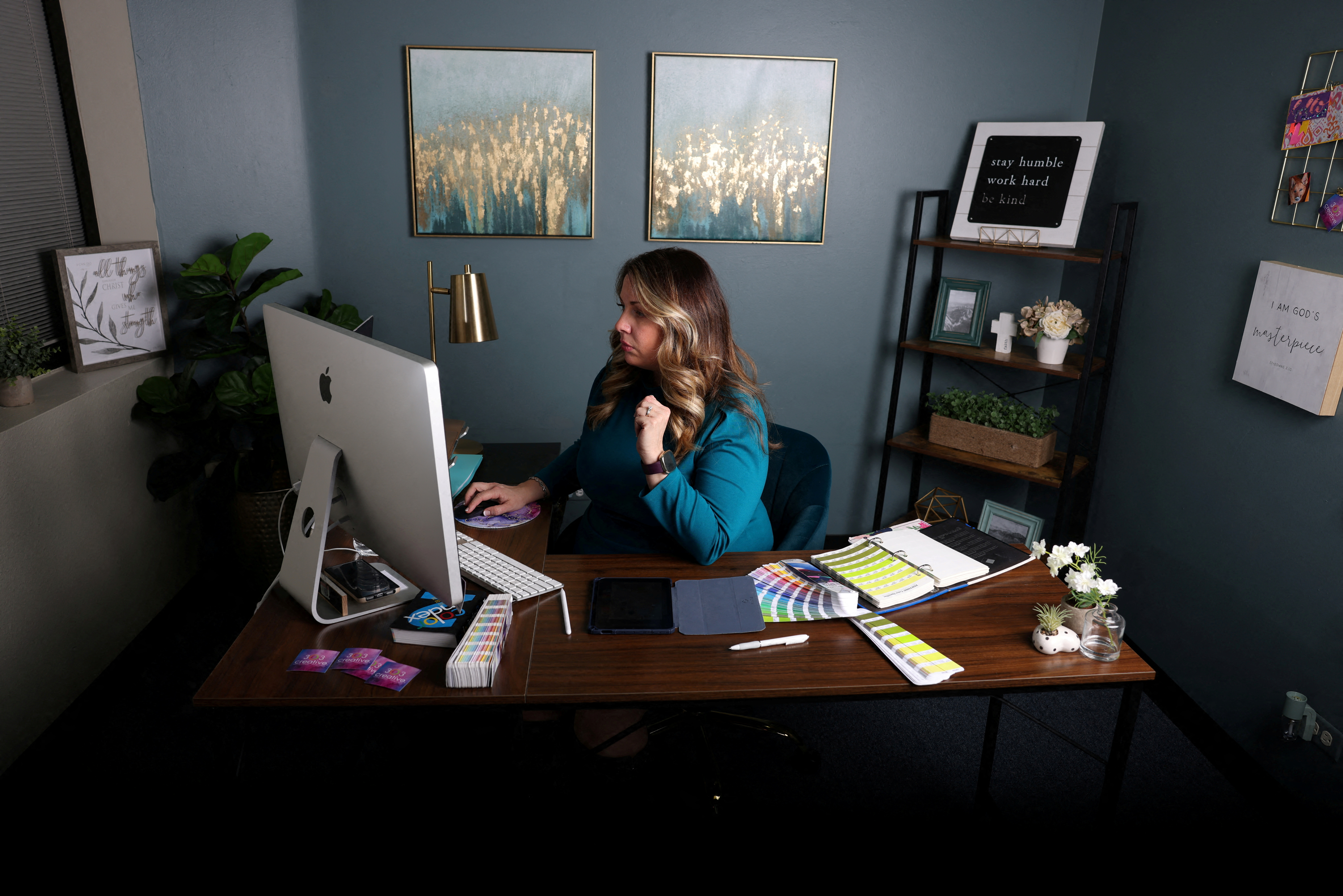 Web designer Lorie Smith, plaintiff in a Supreme Court case who objects to same-sex marriage, poses for a portrait at her office in Littleton, Colorado, Nov. 28, 2022.