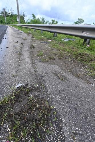 A tire track where a vehicle slid into the guard rail, shown Monday, July 17, 2023, after a two-car crash Sunday in Asan.