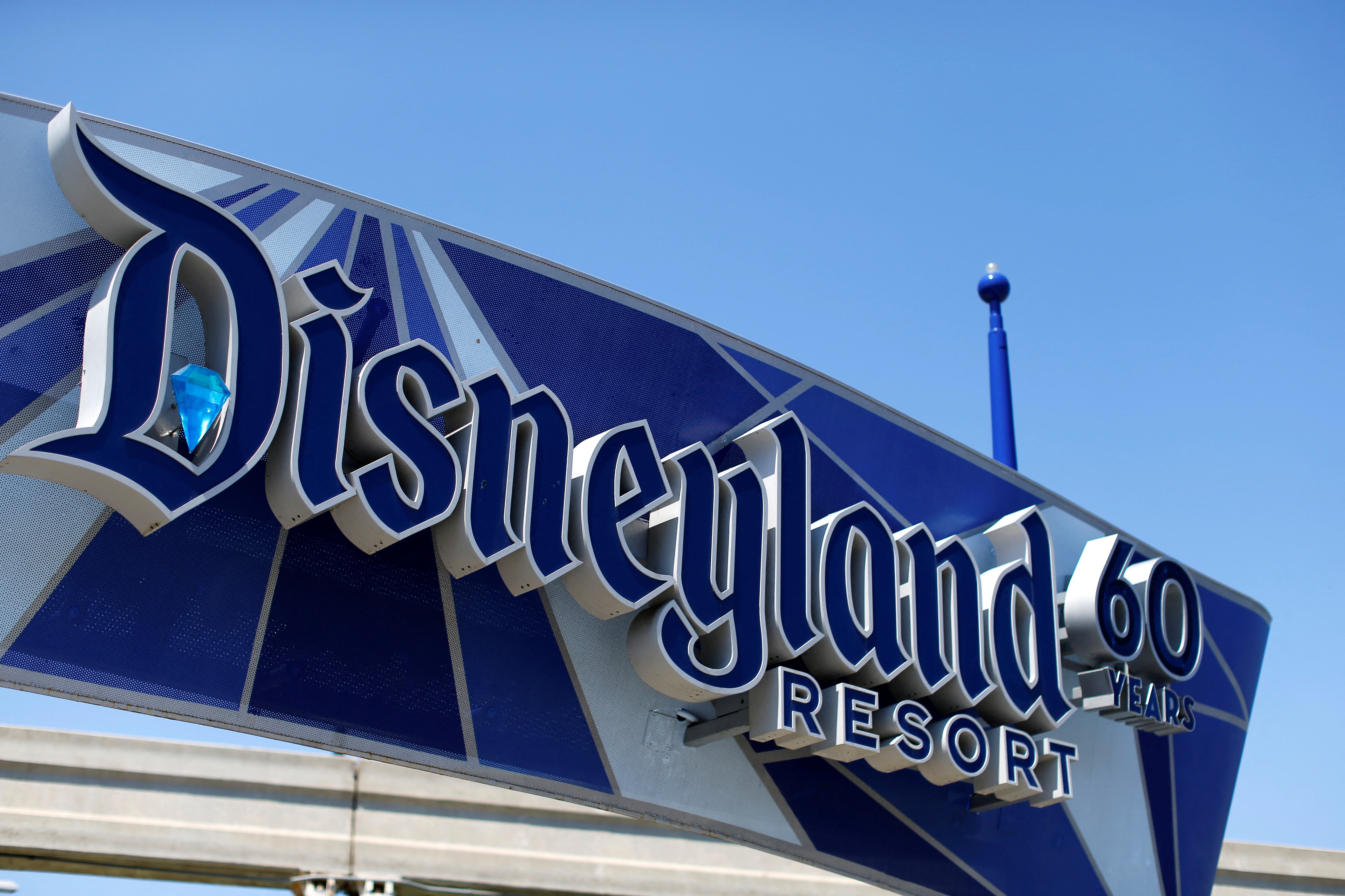 FILE PHOTO: The Disneyland logo is shown near the entrance to Disneyland in Anaheim, California April 13, 2016. REUTERS/Mike Blake/File Photo
