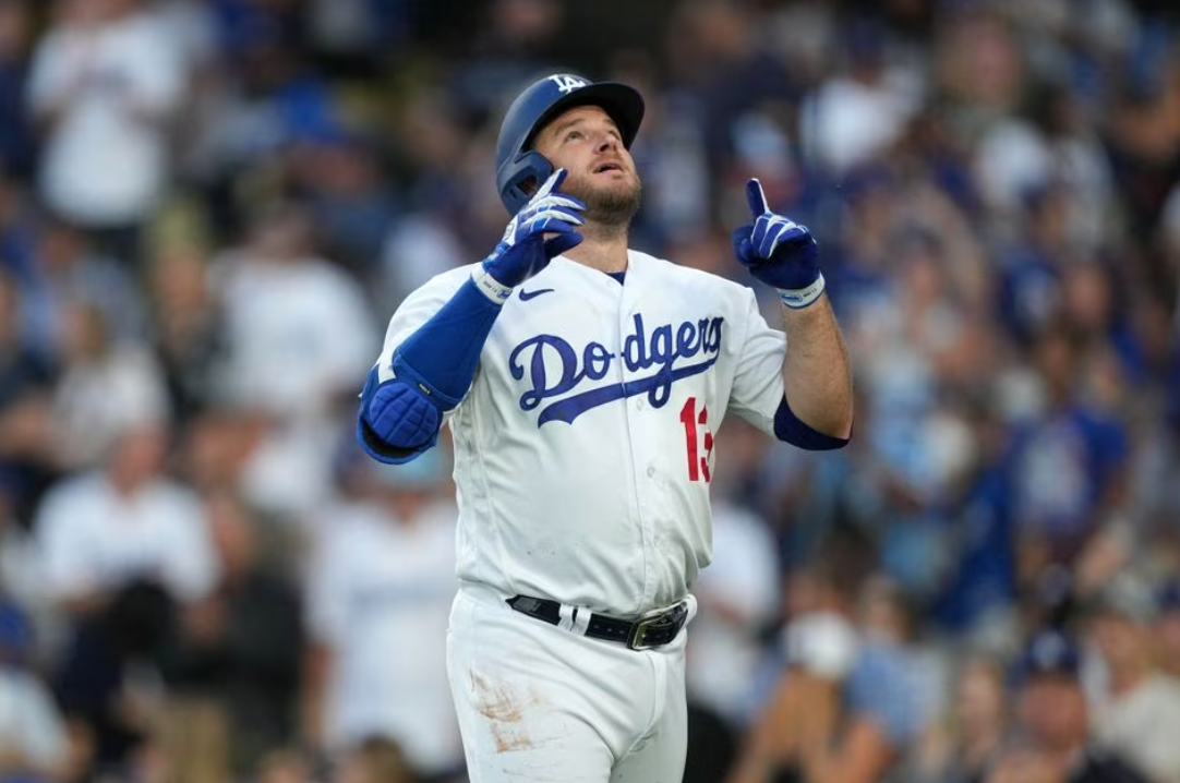 Los Angeles Dodgers third baseman Max Muncy (13) reacts after hitting a solo home run in the second inning against the Pittsburgh Pirates at Dodger Stadium in Los Angeles, California, July 3, 2023.
