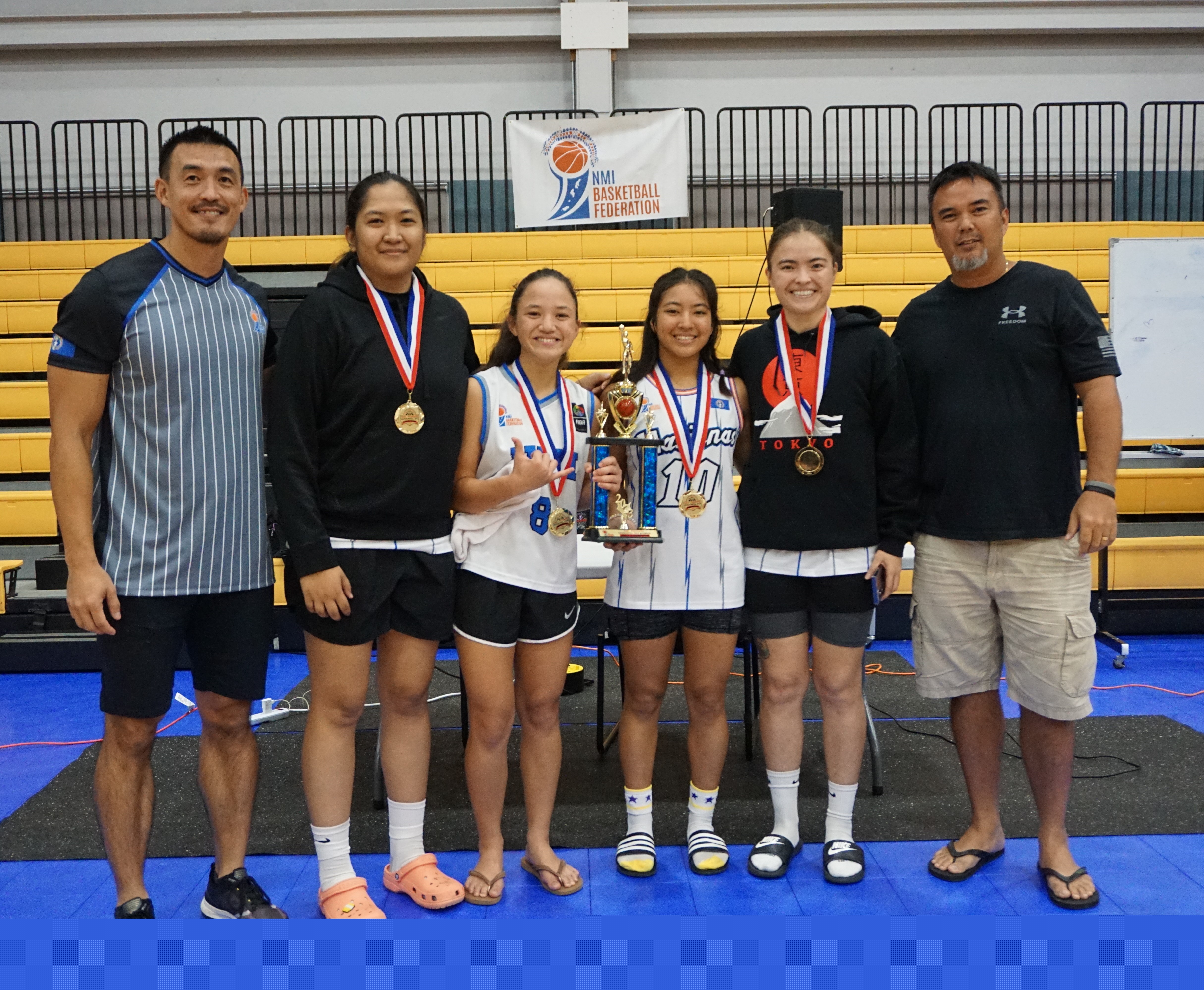 The players of Shots Fired pose for a photo after topping the 3x3 women's division of the 2023 NMI-Pohnpei Goodwill Basketball Games on Friday at the Ada gym.