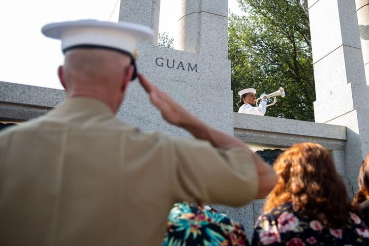 The 36th assistant commandant of the Marine Corps, Gen. Eric M. Smith, salutes during a ceremony for the 79th anniversary of the Liberation of Guam at the World War II Memorial in Washington, D.C., on Thursday, July 13, 2023.