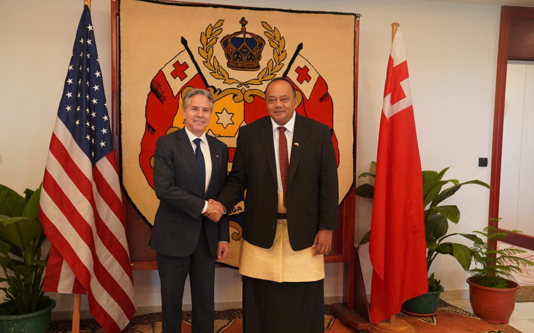 US Secretary of State Antony Blinken shakes hands with Tonga’s Prime Minister Tonga’s Prime Minister Hu’akavemeiliku Siaosi in Nuku'alofa on 26 July, 2023.