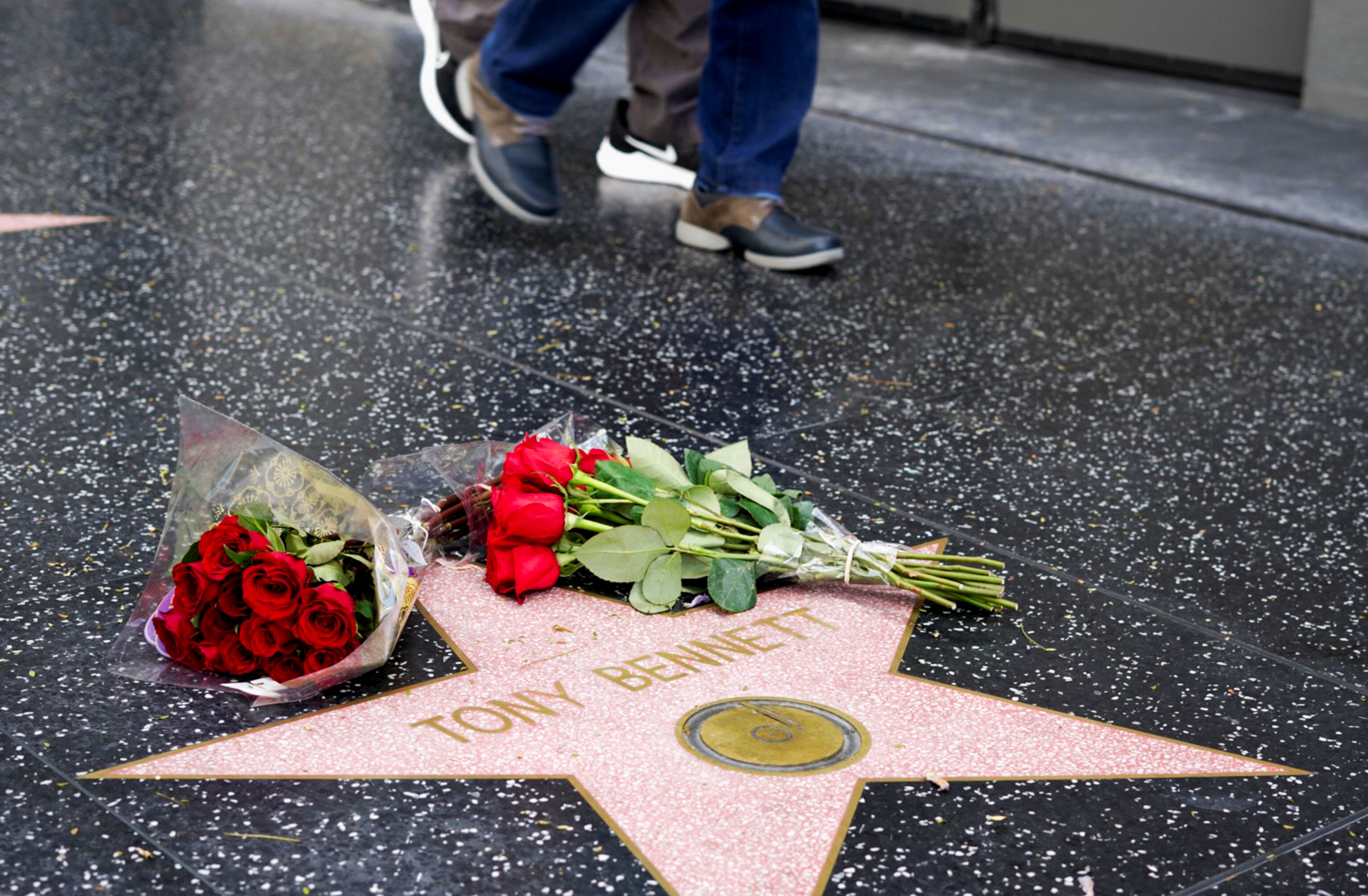 Flowers are laid on Tony Bennett's Hollywood Walk of Fame star, in Los Angeles, California, U.S., July 21, 2023. REUTERS/Jorge Garcia