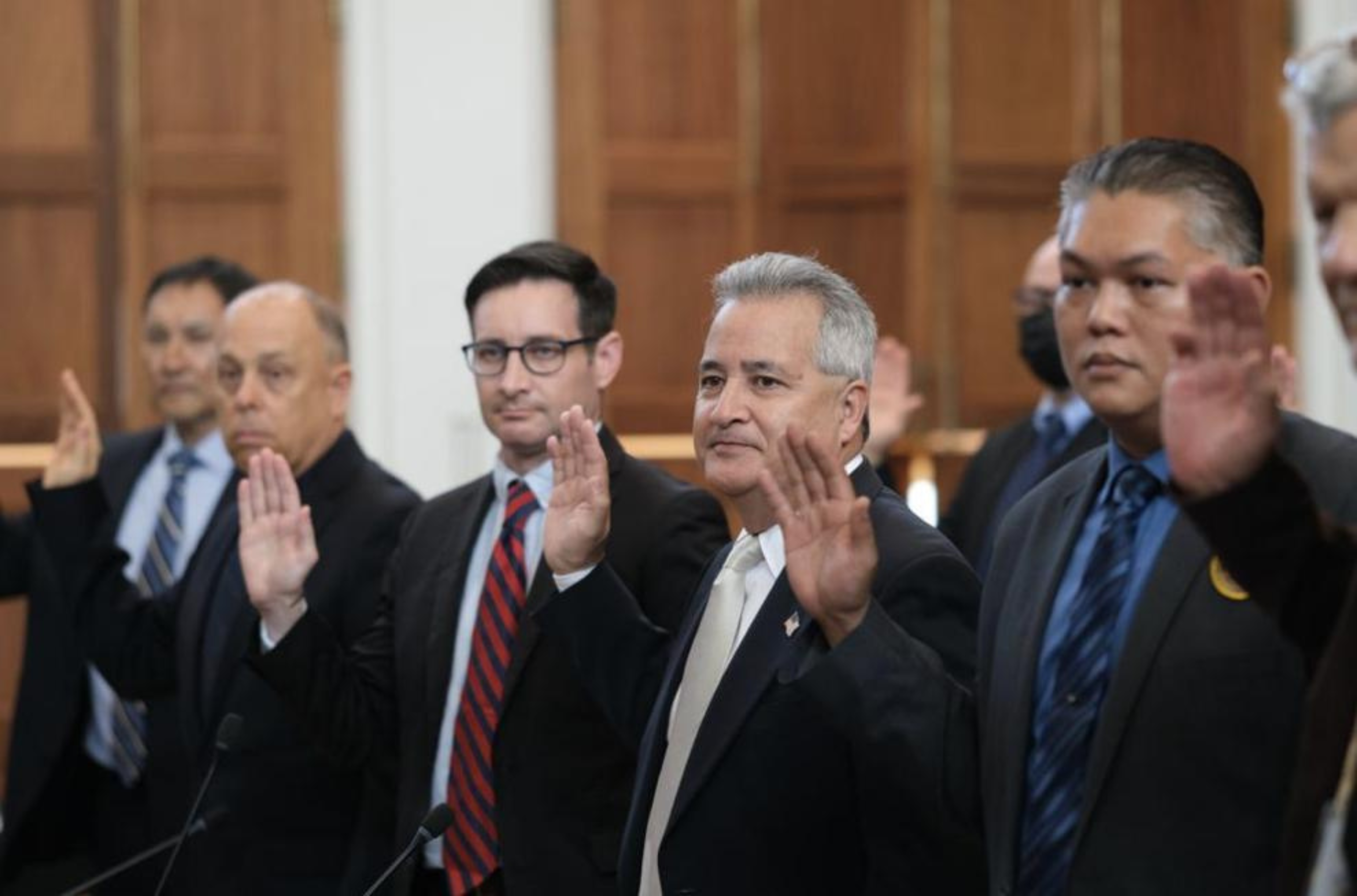 Attorney General Douglas Moylan, second from right, and staff from the Office of the Attorney General are sworn in before a legislative budget hearing Friday, July 14, 2023, at the Guam Congress Building in Hagåtña. 