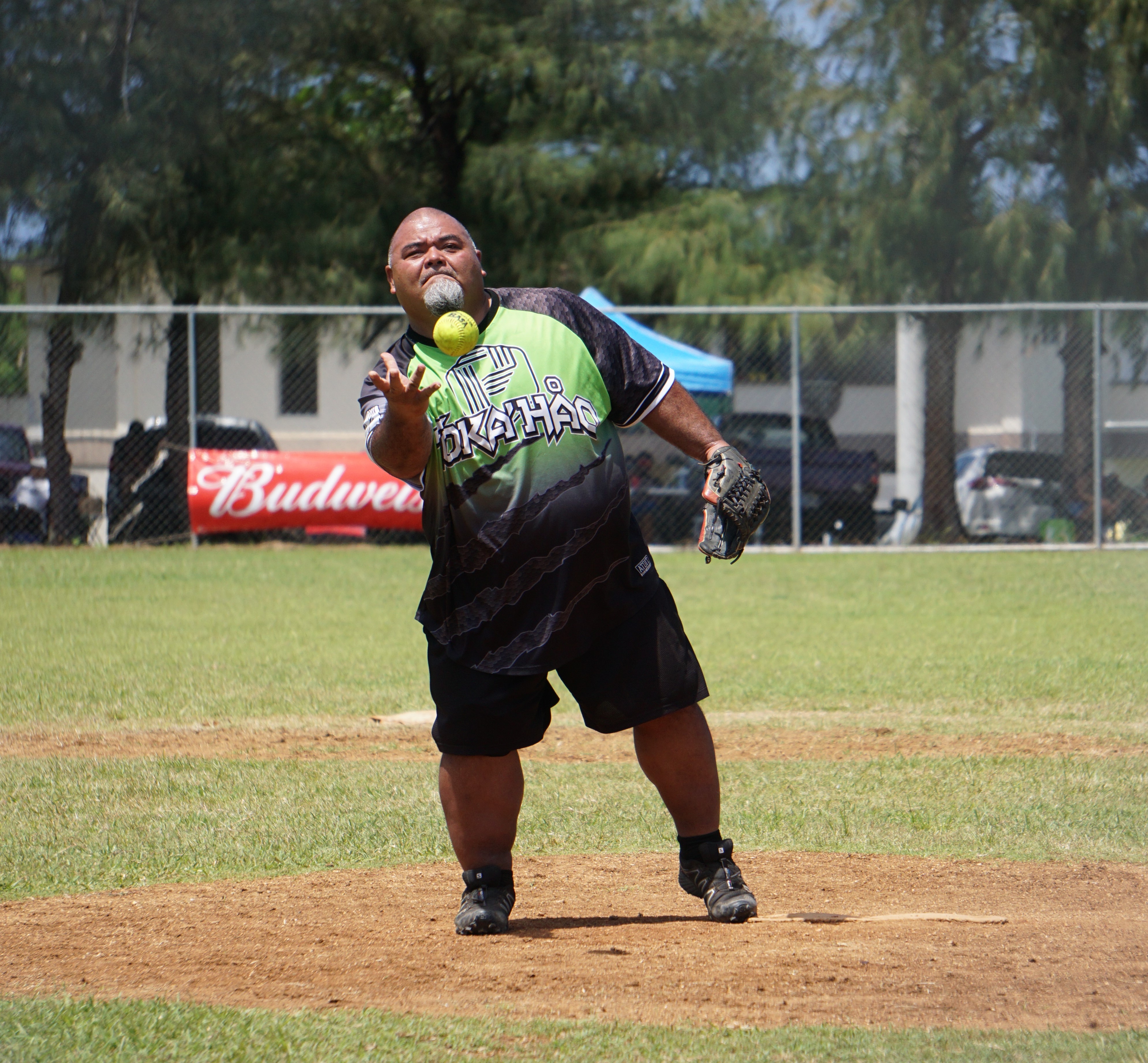 Payday Hao's Jojo Attao pitches during a 2023 Budweiser Belau Amateur Softball Association Open League game at the Dandan baseball field.