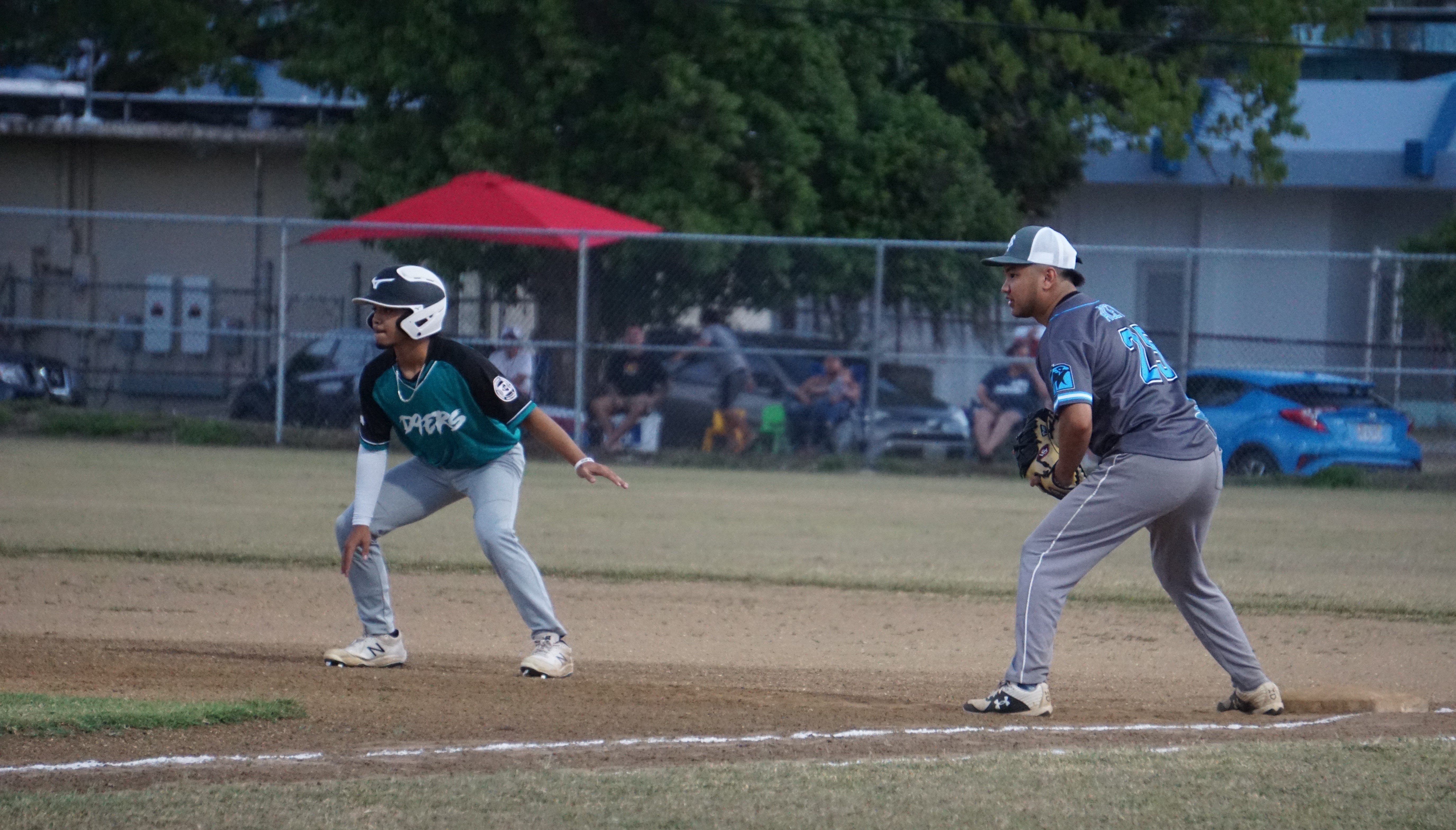 A D9er's player readies to steal second base during a game against the Falcons in the 2023 Tan Holdings Saipan Baseball League at the Francisco "Tan Ko" Palacios Baseball Field.