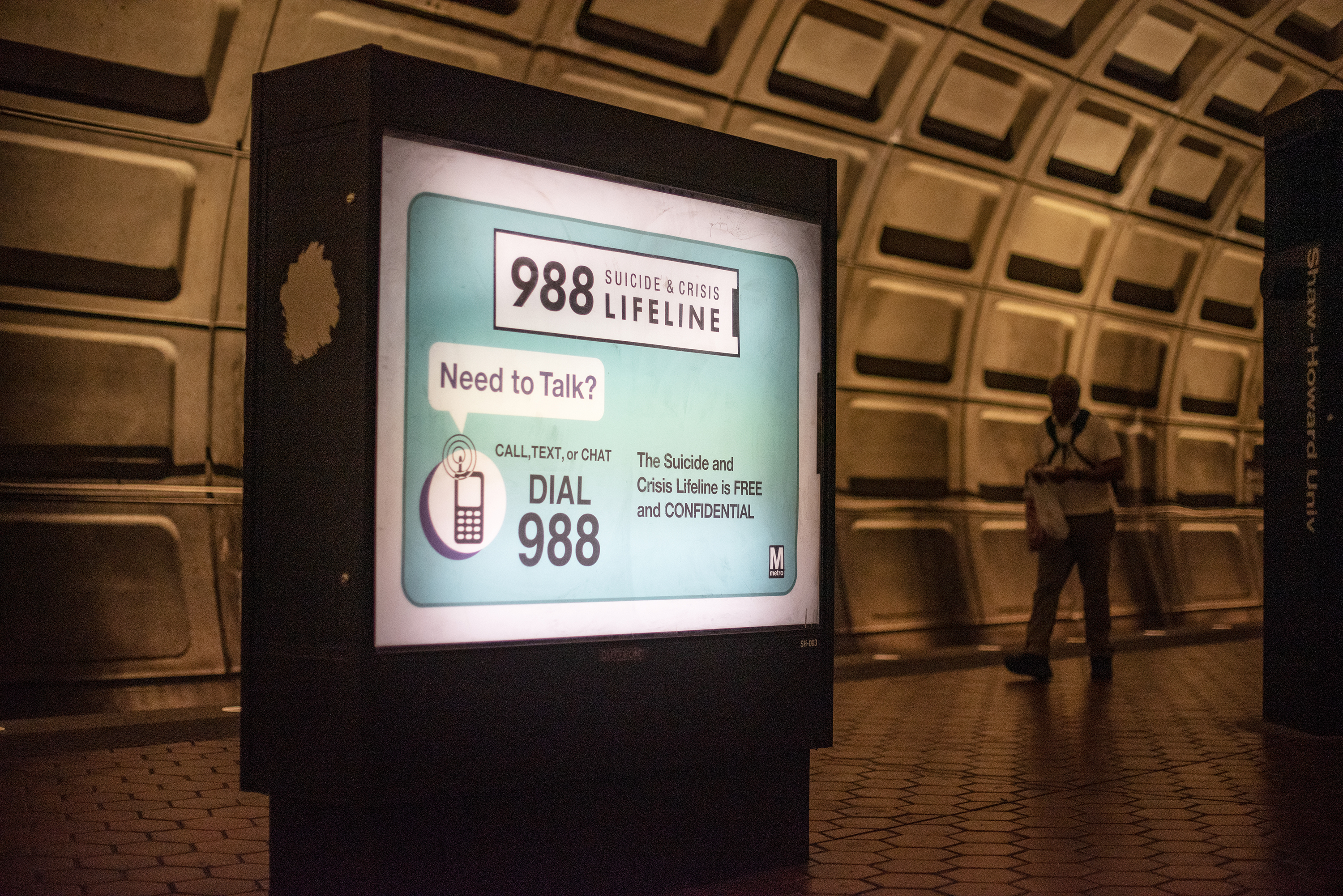 An advertisement for the Suicide and Crisis Lifelineâ€™s 988 hotline is seen at the Shaw-Howard University subway station in Washington, D.C. (Eric Harkleroad/KFF Health News/TNS)