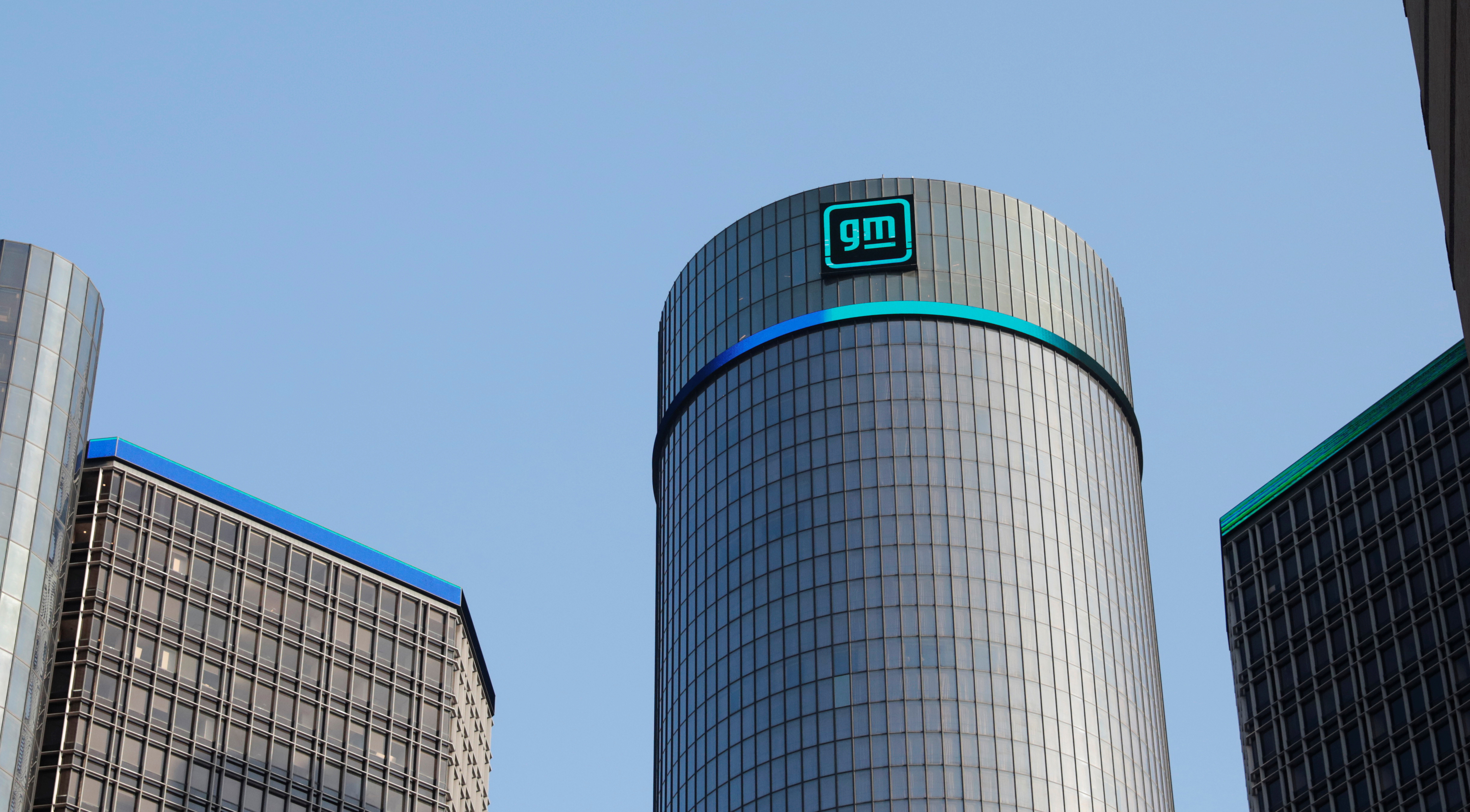 The new GM logo is seen on the facade of the General Motors headquarters in Detroit, Michigan, U.S., March 16, 2021. REUTERS/Rebecca Cook