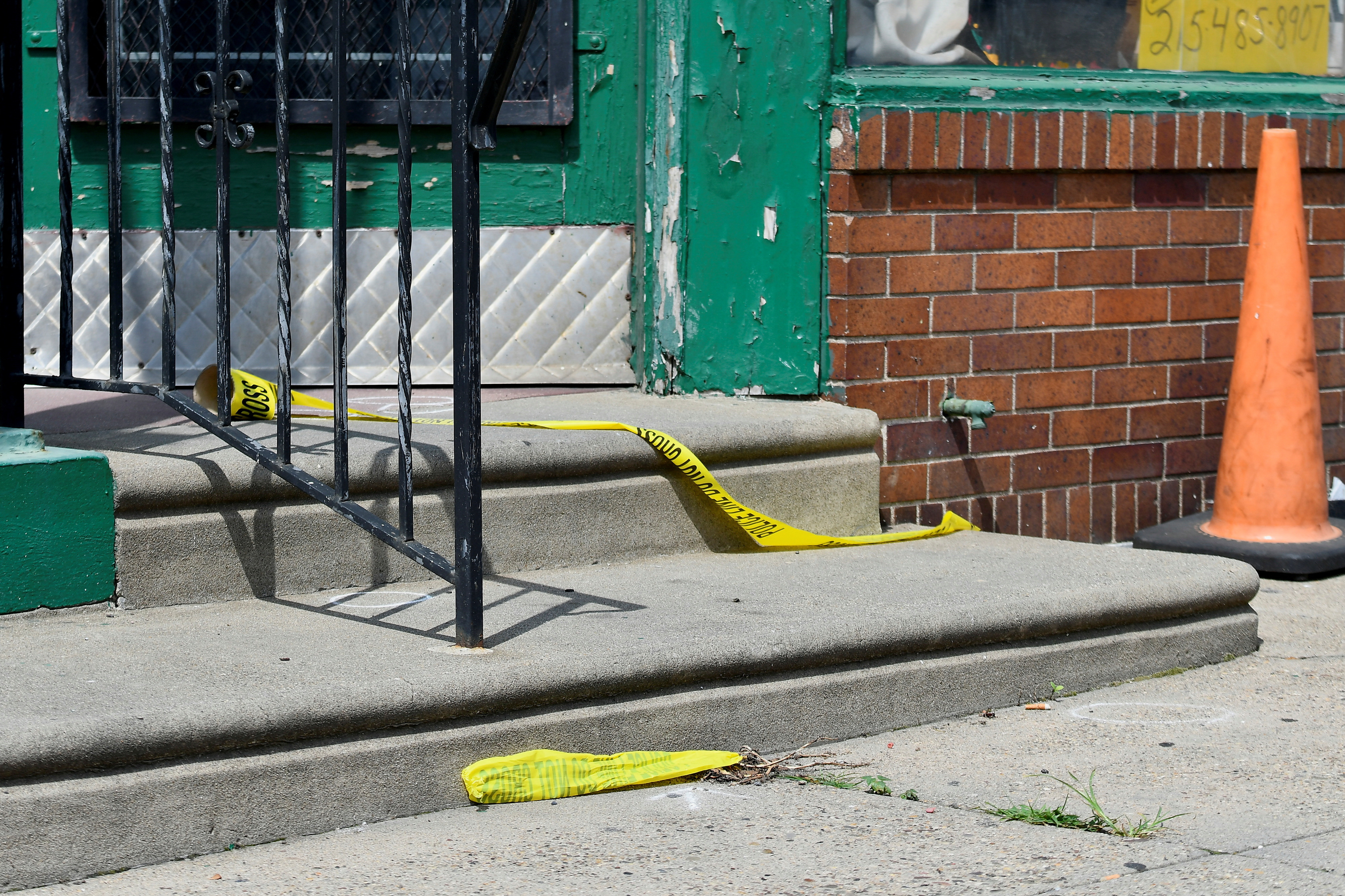 Police tape is seen as investigations are ongoing the day after a mass shooting in the Kingsessing section of southwest Philadelphia, Pennsylvania, U.S. July 4, 2023. REUTERS/Bastiaan Slabbers