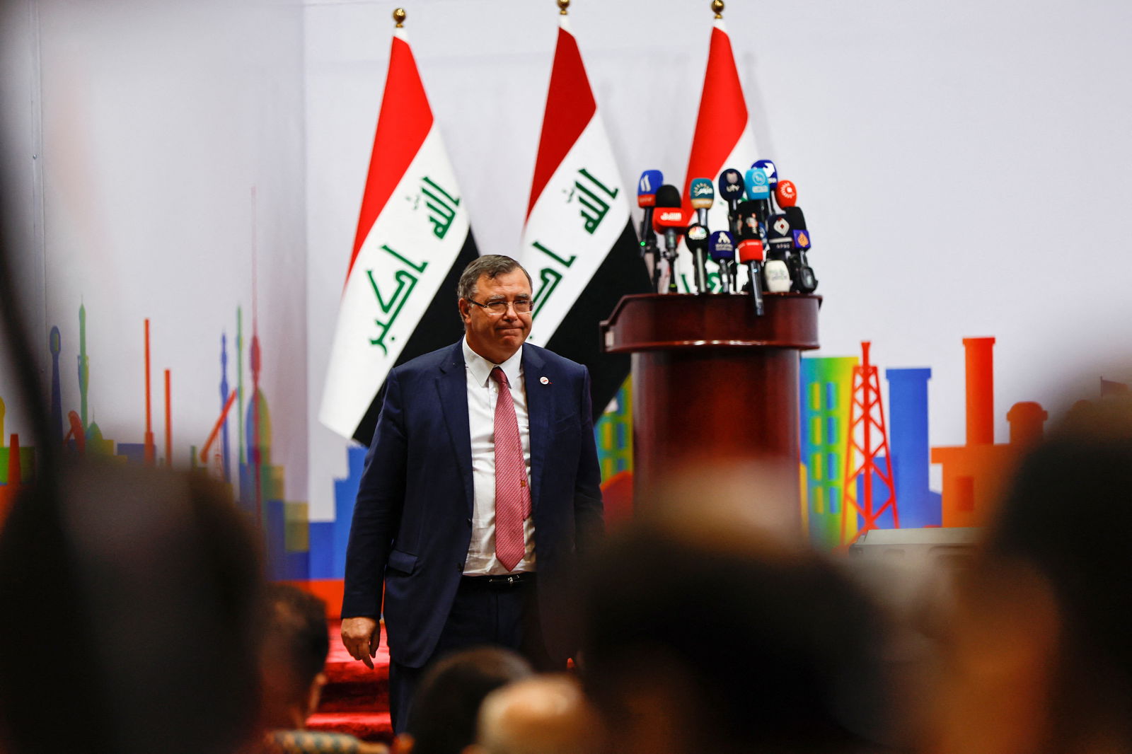 Patrick Pouyanne, Chairman and CEO of TotalEnergies, walks at a signing ceremony of the Gas Growth Integrated Project (GGIP) in Baghdad, Iraq, July 10, 2023. REUTERS/Thaier Al-Sudani