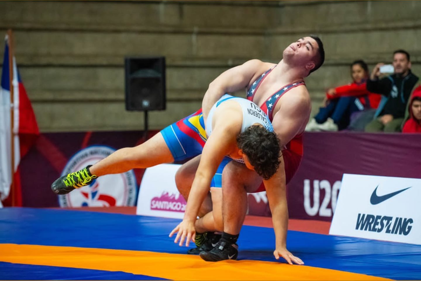 Aden Attao attempts a suplex on his opponent during a 2023 U20 Pan-American Championships wrestling match Thursday in Santiago, Chile.