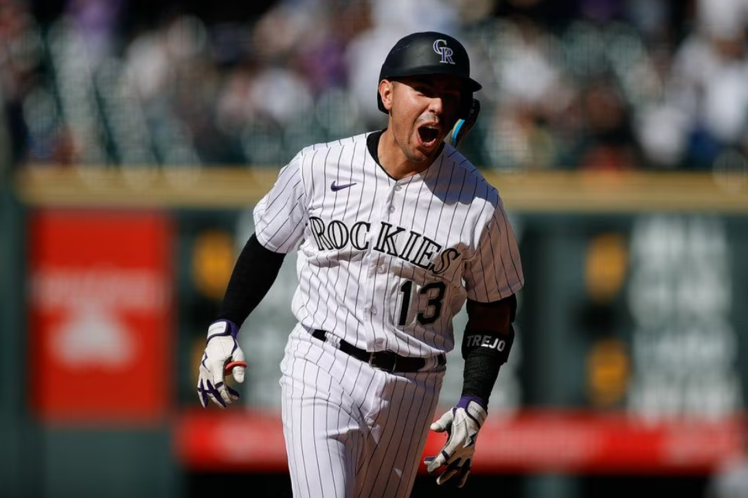 Colorado Rockies second baseman Alan Trejo (13) rounds the bases on a walk-off solo home run in the eleventh inning against the New York Yankees at Coors Field in Denver, Colorado, July 16, 2023.
